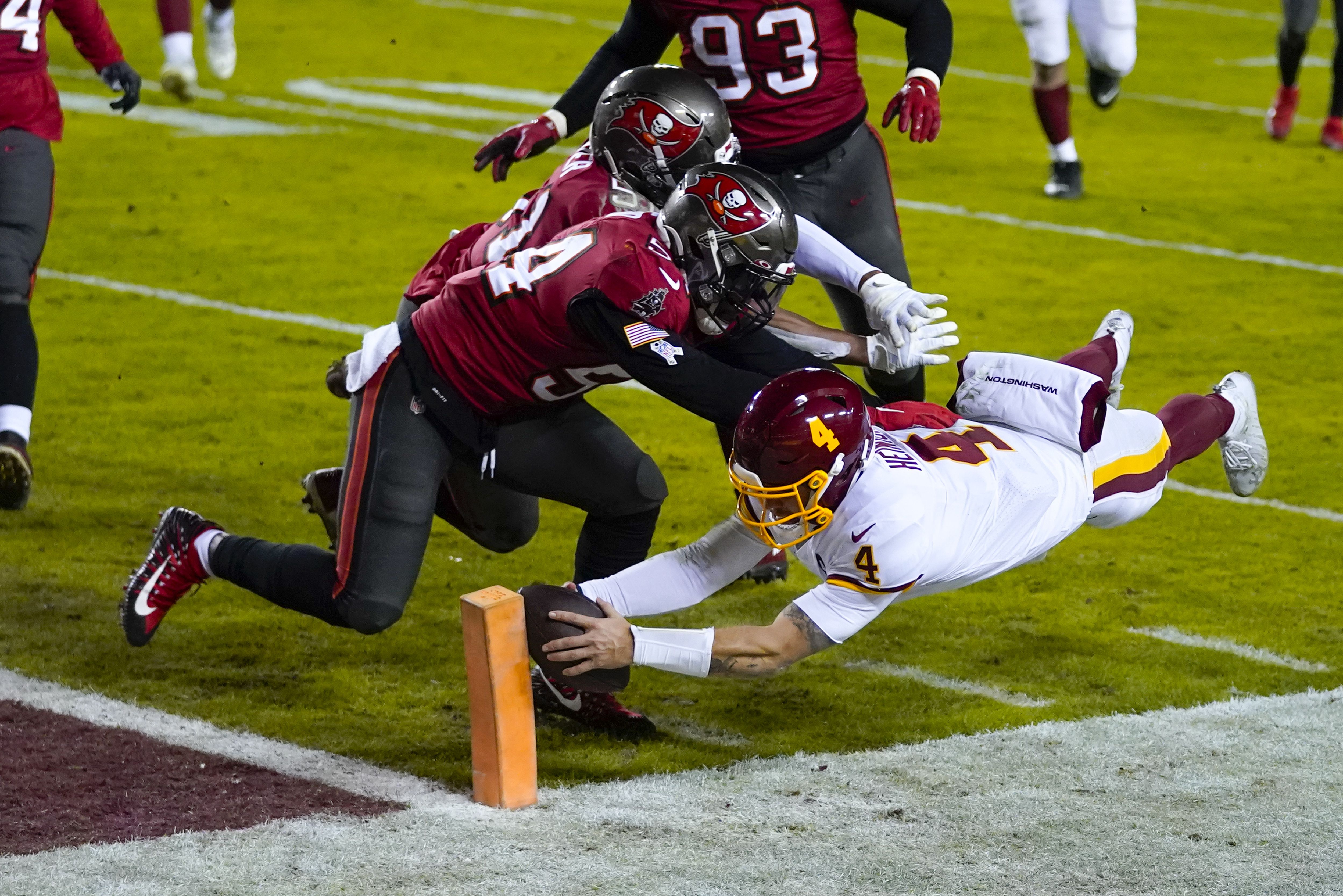 Washington Football Team's Taylor Heinicke scores with a beer