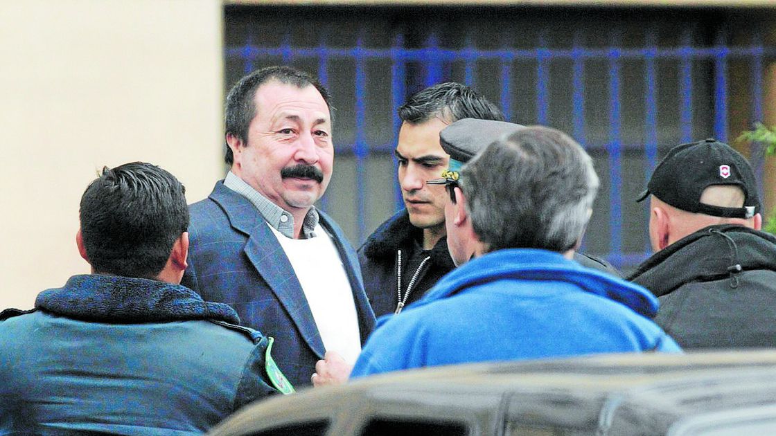 Chilean citizen Sergio Galvarino Apablaza is led into court by police officers