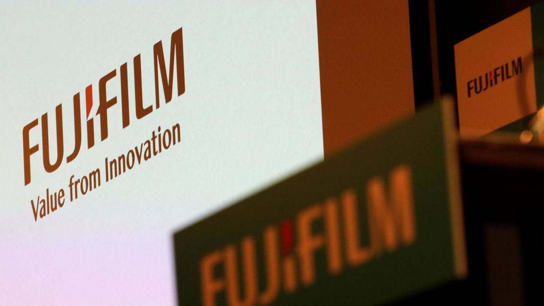 Fujifilm Holdings' logos are pictured ahead of its news conference in Tokyo