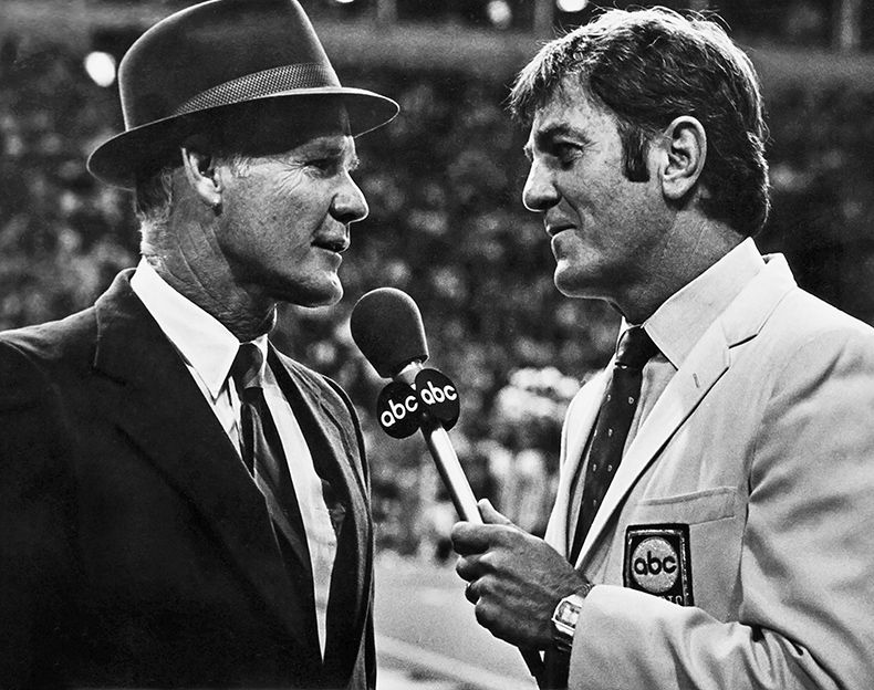 Dallas Cowboys head coach Tom Landry and QB Don Meredith on sidelines