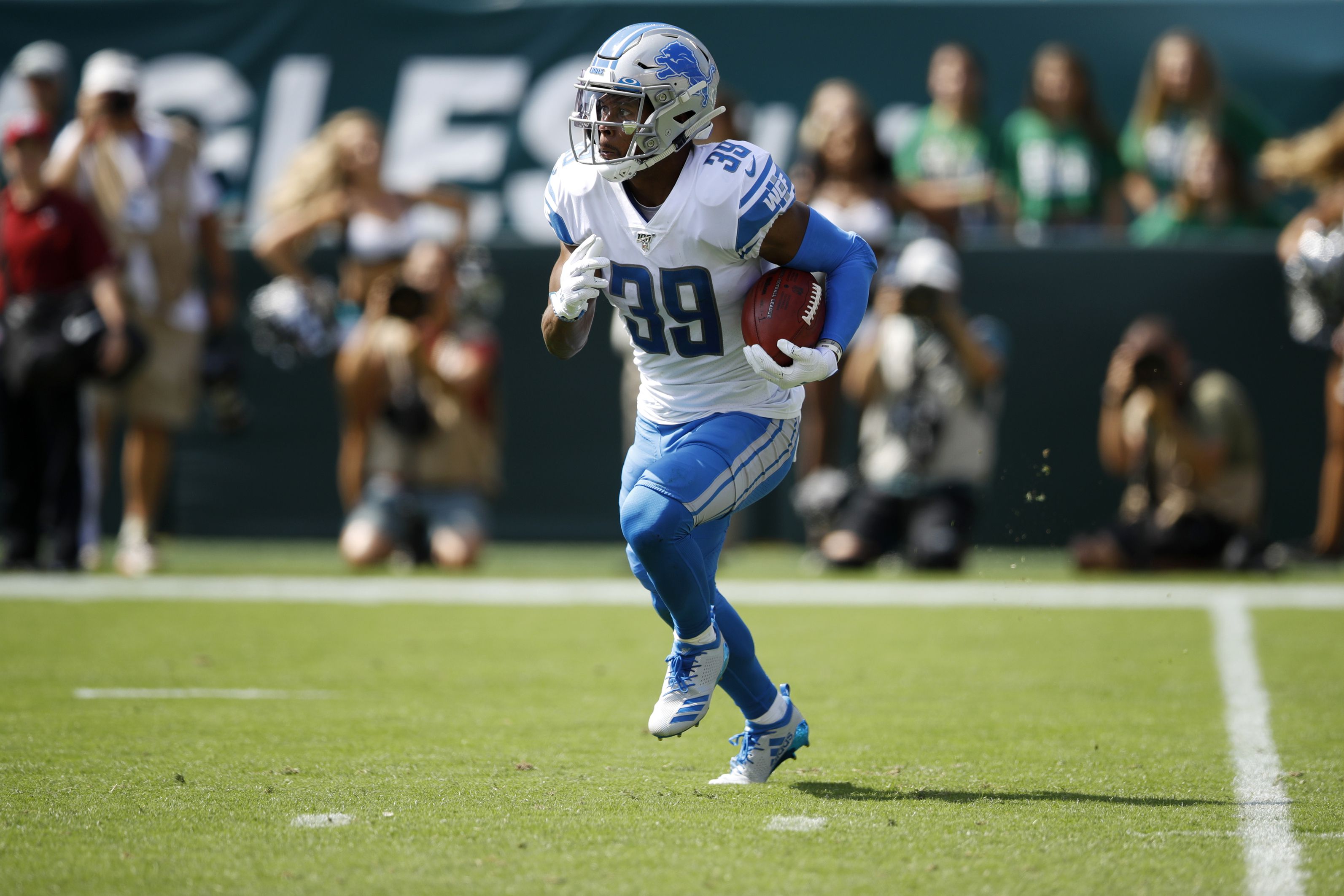 Detroit Lions defensive end Mike Daniels (96) walks off the field