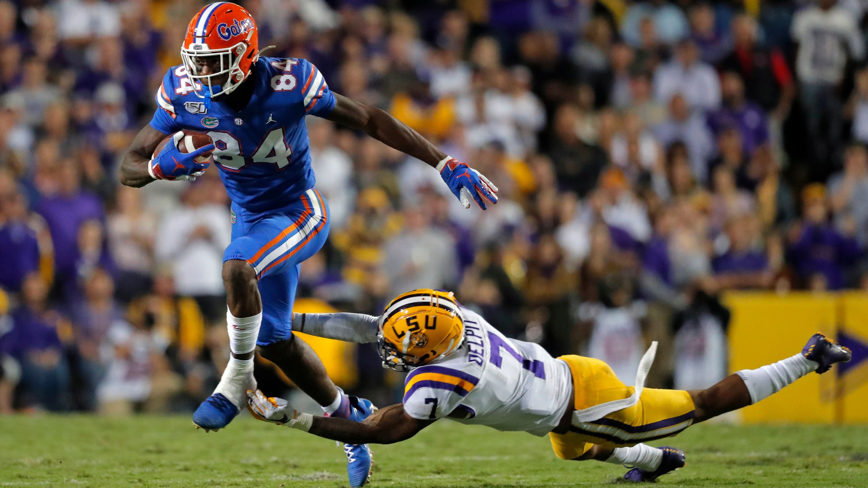 Kyle Pitts Florida Gators Unsigned Breaking Tackle Photograph