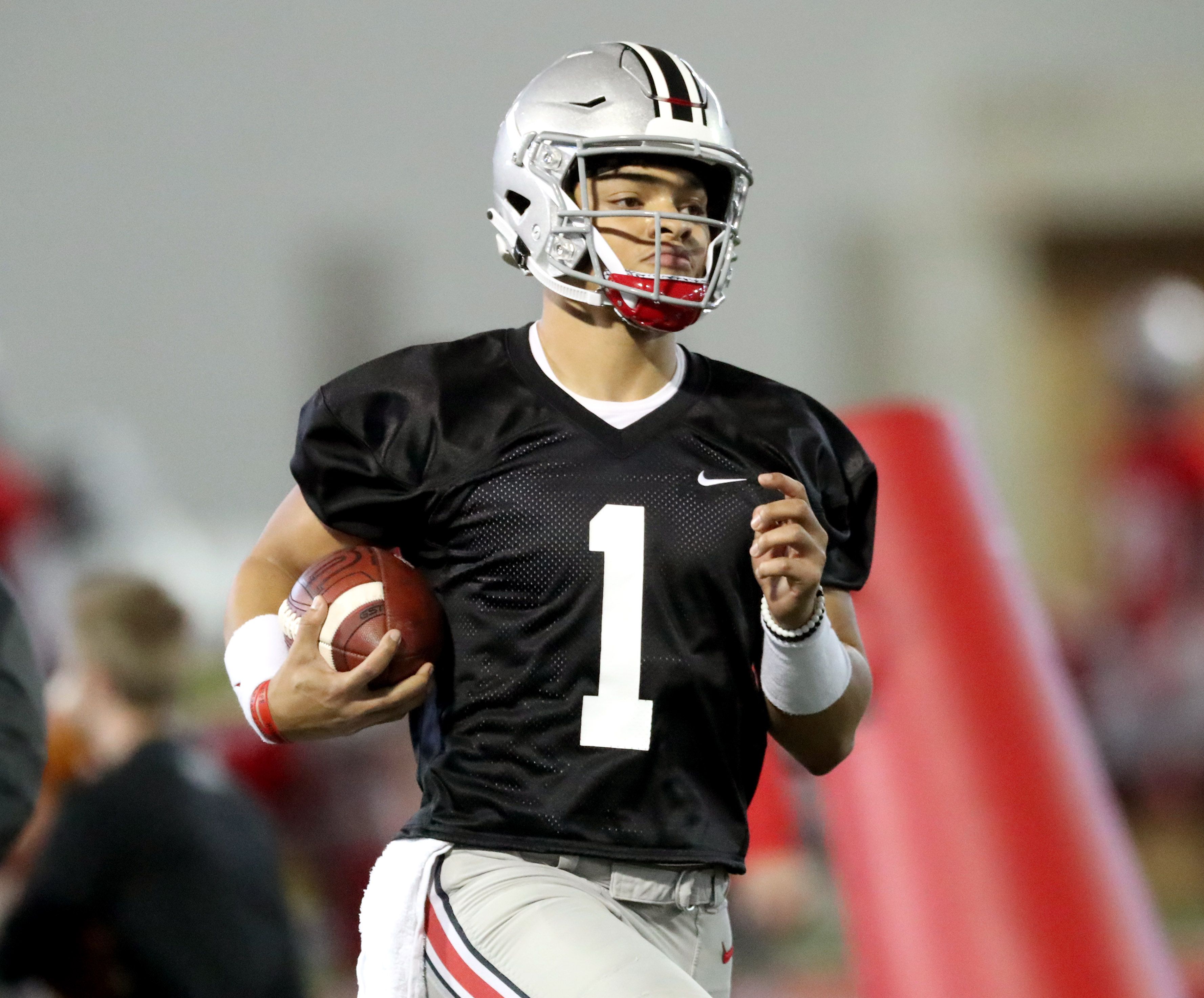 How does Ohio State football's Justin Fields look warming up in preparation  for National Championship? 