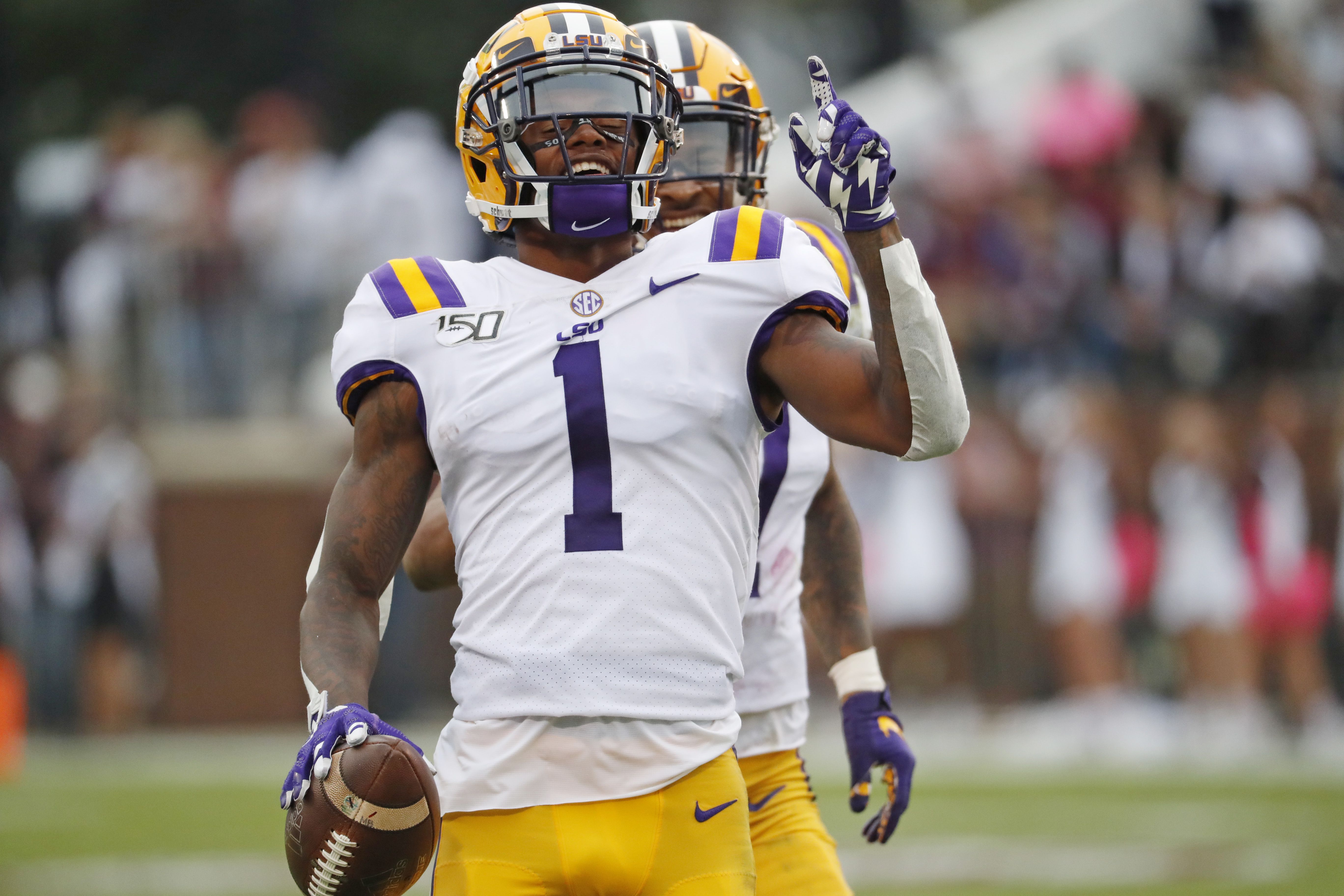 Ja'Marr Chase LSU Tigers Autographed 11 x 14 Diving Spotlight Photograph