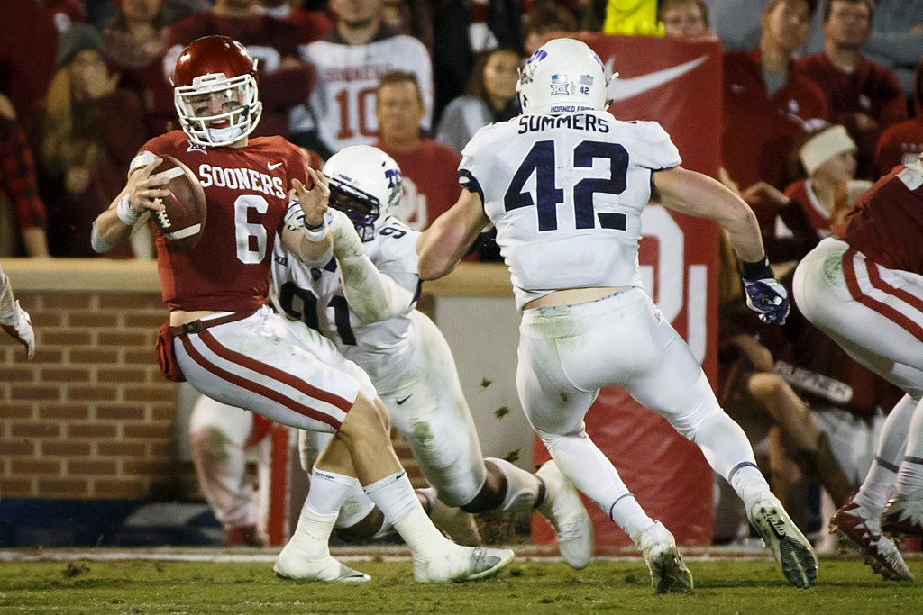 Watch OU QB Baker Mayfield hit a TCU player in the head with throw