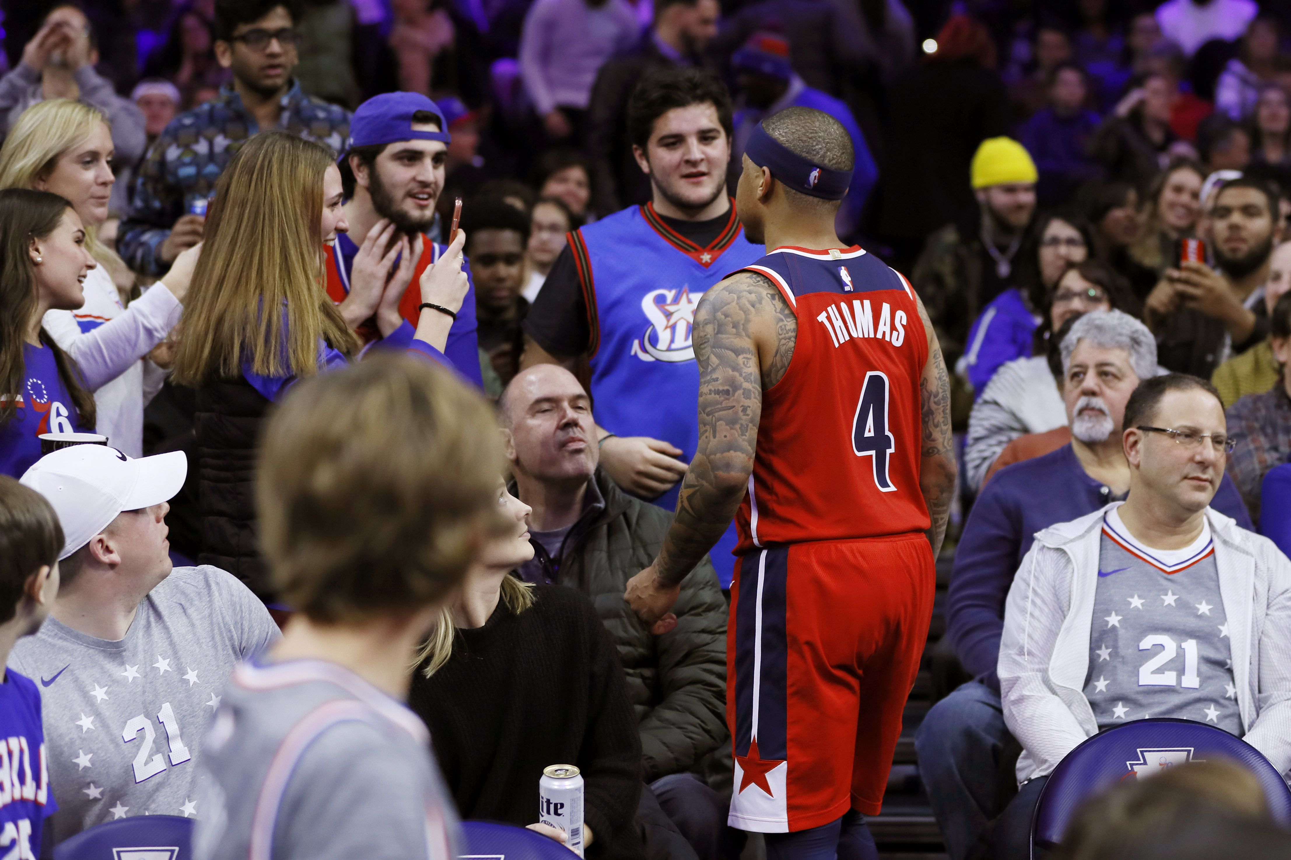 Two Sixers fans banned, Isaiah Thomas suspended - The Boston Globe