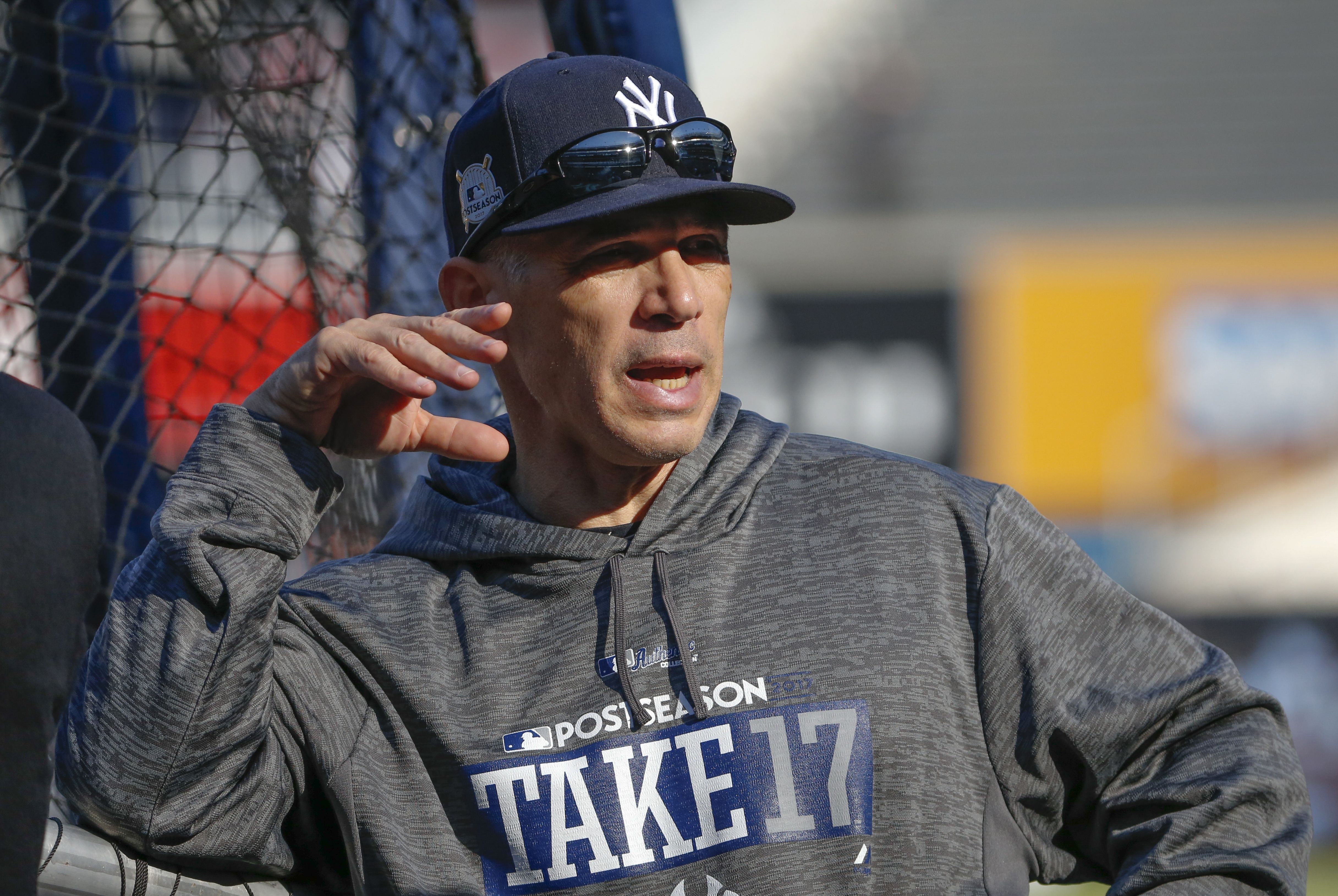 New York Yankees manager Joe Girardi walks back to the dug out in