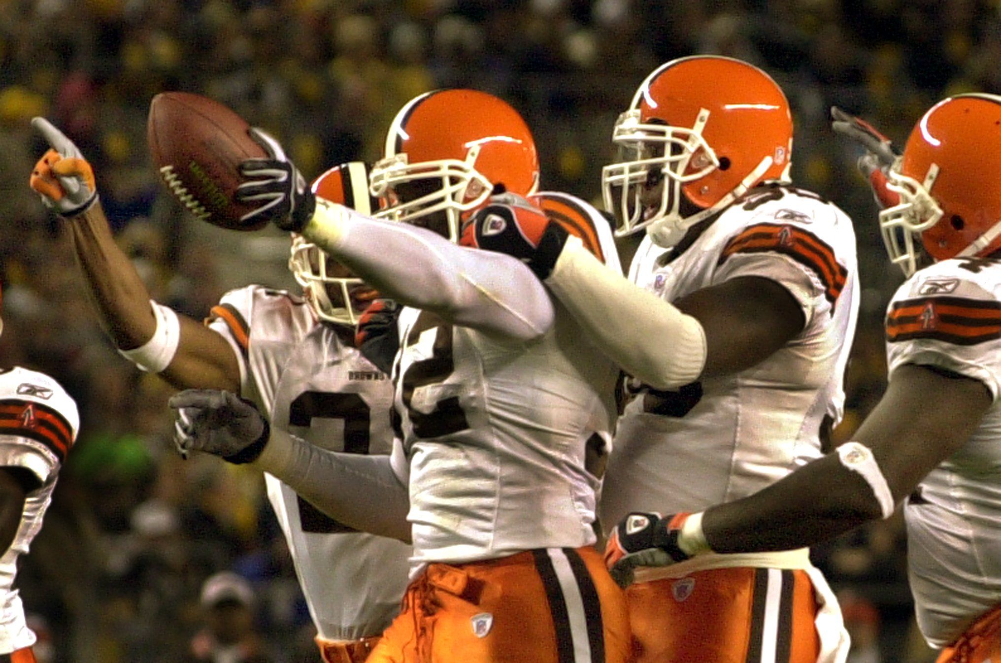 Cleveland Browns quarterback Tim Couch celebrates after scoring on a 9-yard  run late in the first half Sunday night, Oct. 5, 2003, against the  Pittsburgh Steelers in Pittsburgh. Couch, demoted to being