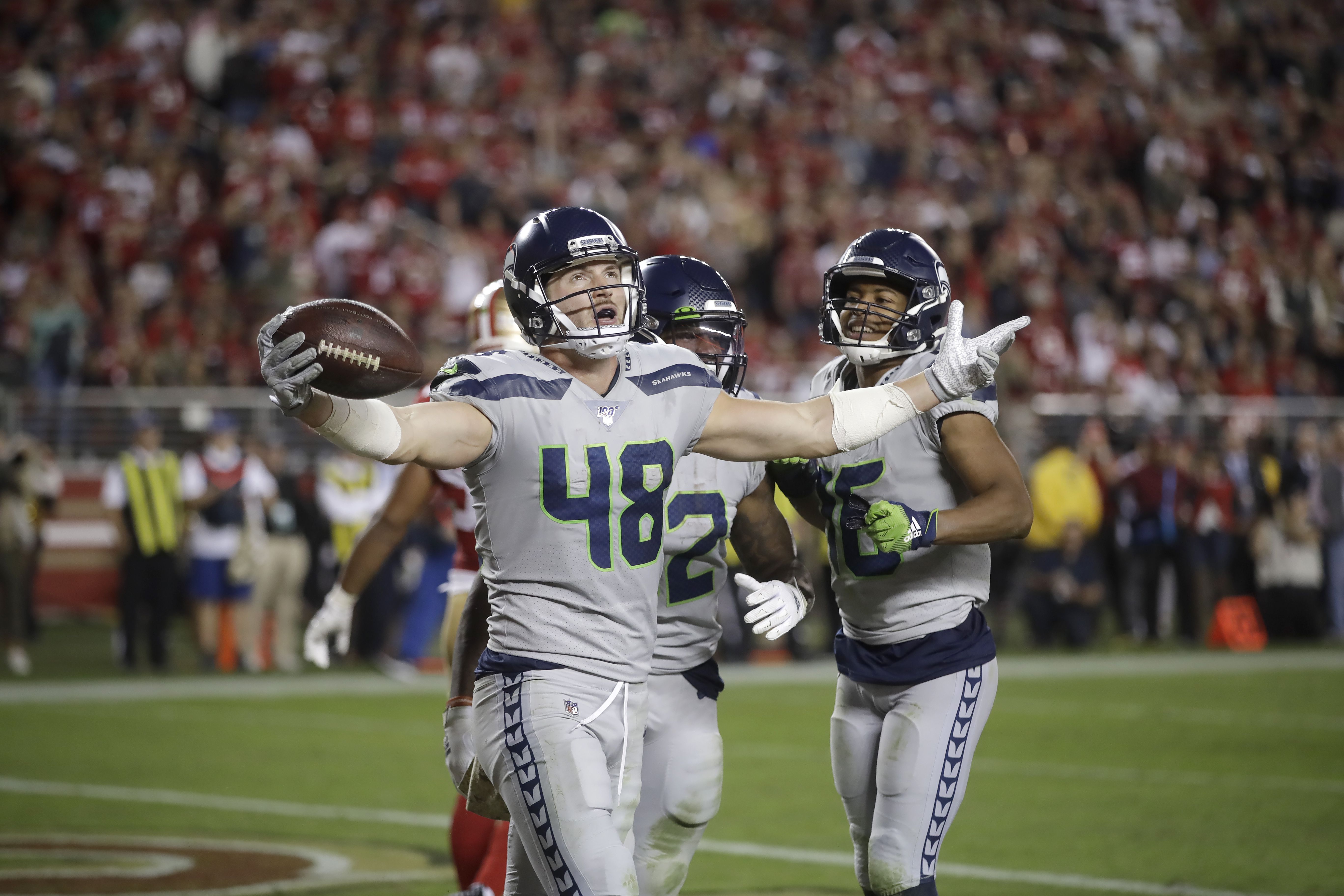 Lamar Jackson runs wild again, this time to top Seattle - The Boston Globe