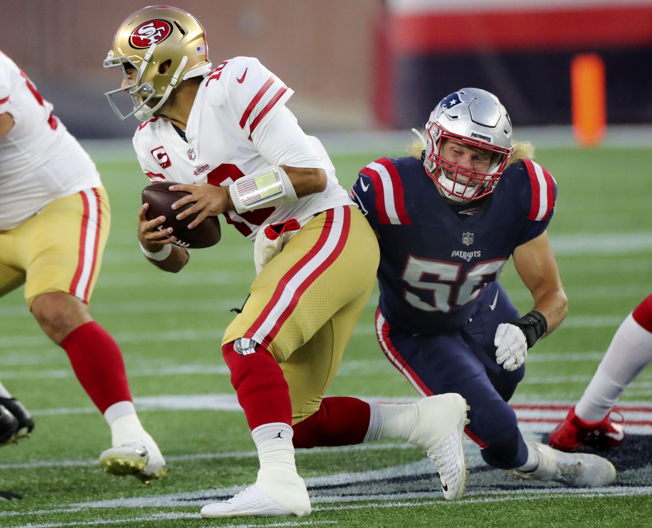 Wilson has 3 TDs before injury, 49ers crush Patriots 33-6