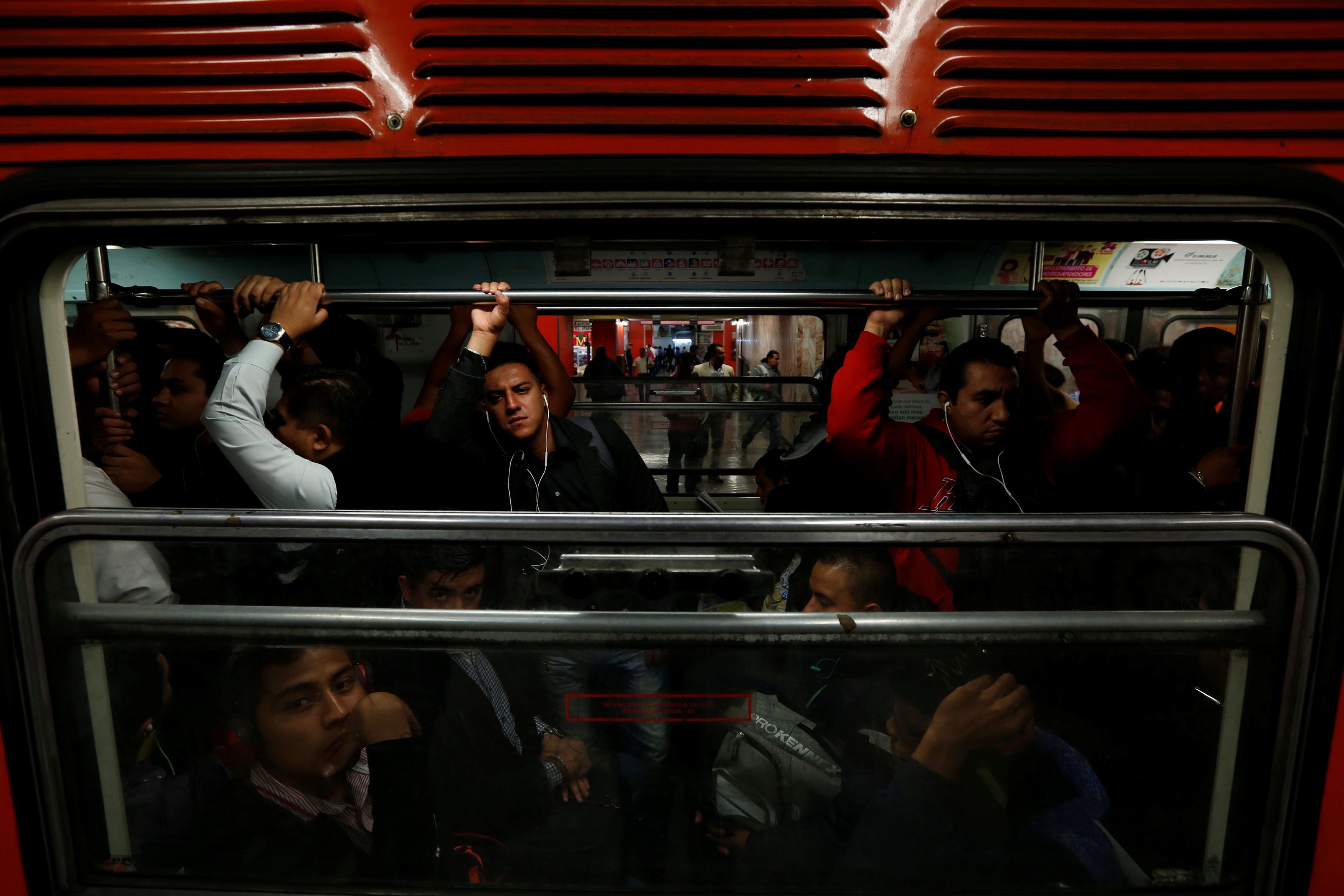 Passengers ride the metro in Mexico City