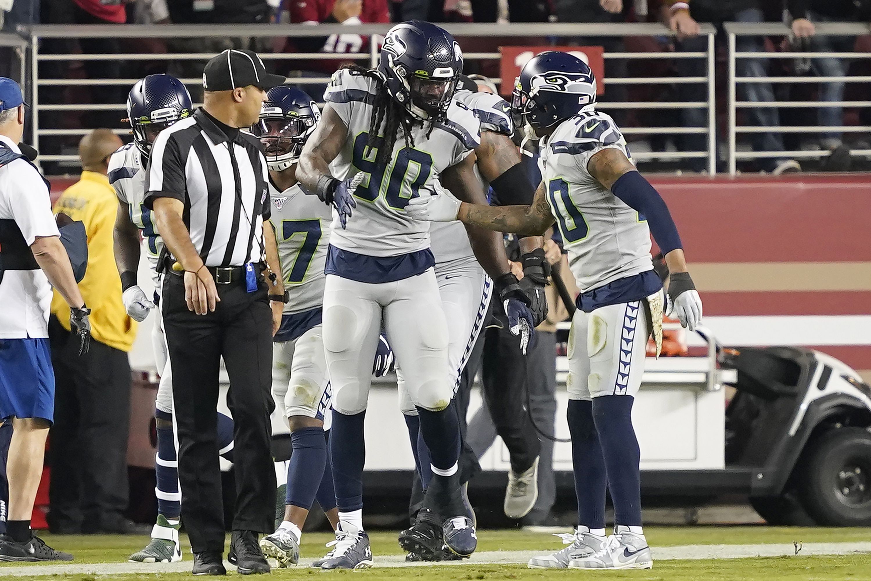 Russell Wilson, Tyler Lockett help Seahawks rally late for 26-23