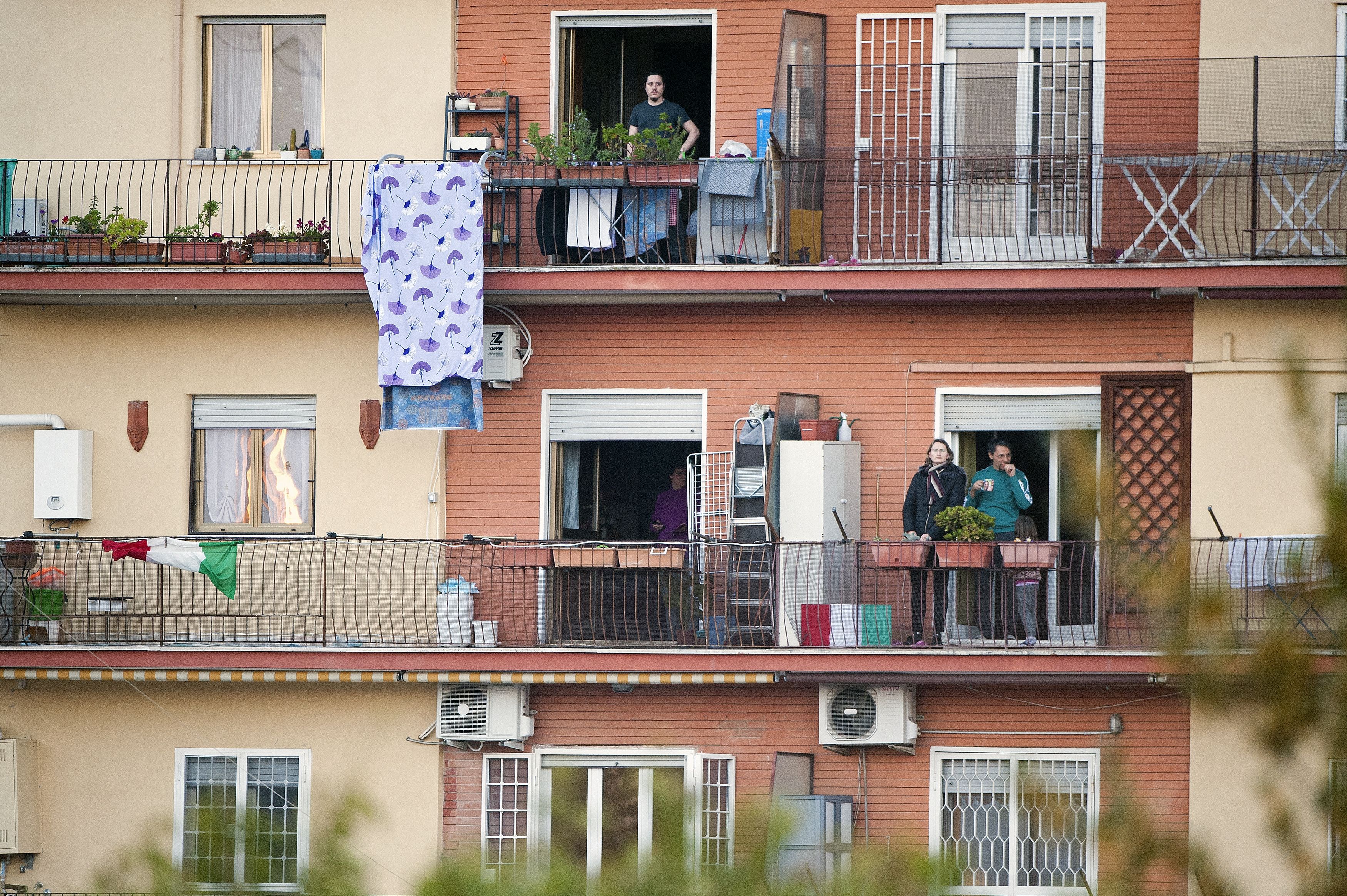 Italians enjoy balcony life during Covid-19 quarantine 