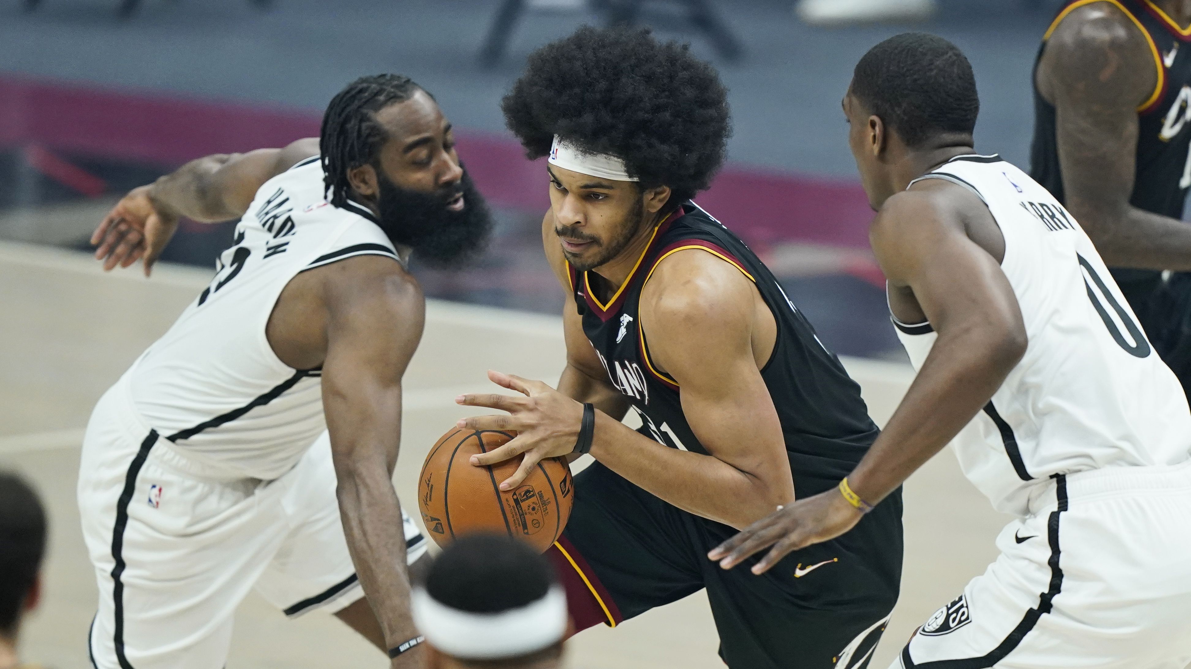 Irving returns, but new-look Nets beaten by Cavs in 2 OTs