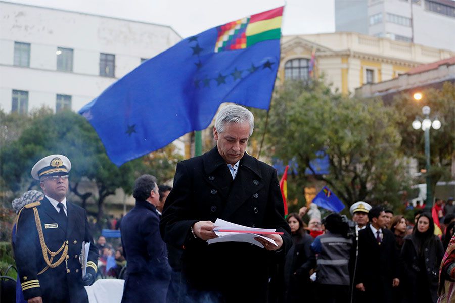 Bolivia's Vice President Alvaro Garcia Linera attends a satellite transmission of Bolivia and Chile presenting their arguments at the World Court, in La Paz