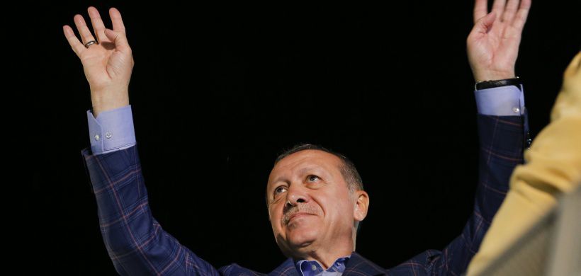 Turkish President Tayyip Erdogan greets his supporters in Istanbul