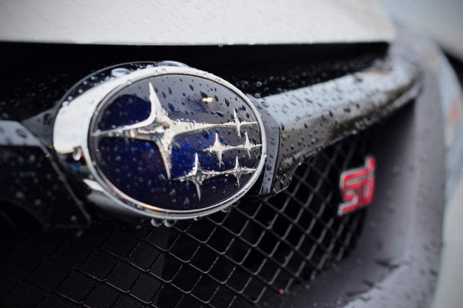 subaru-sti-logo-wallpaper-11556693-900x600.jpg