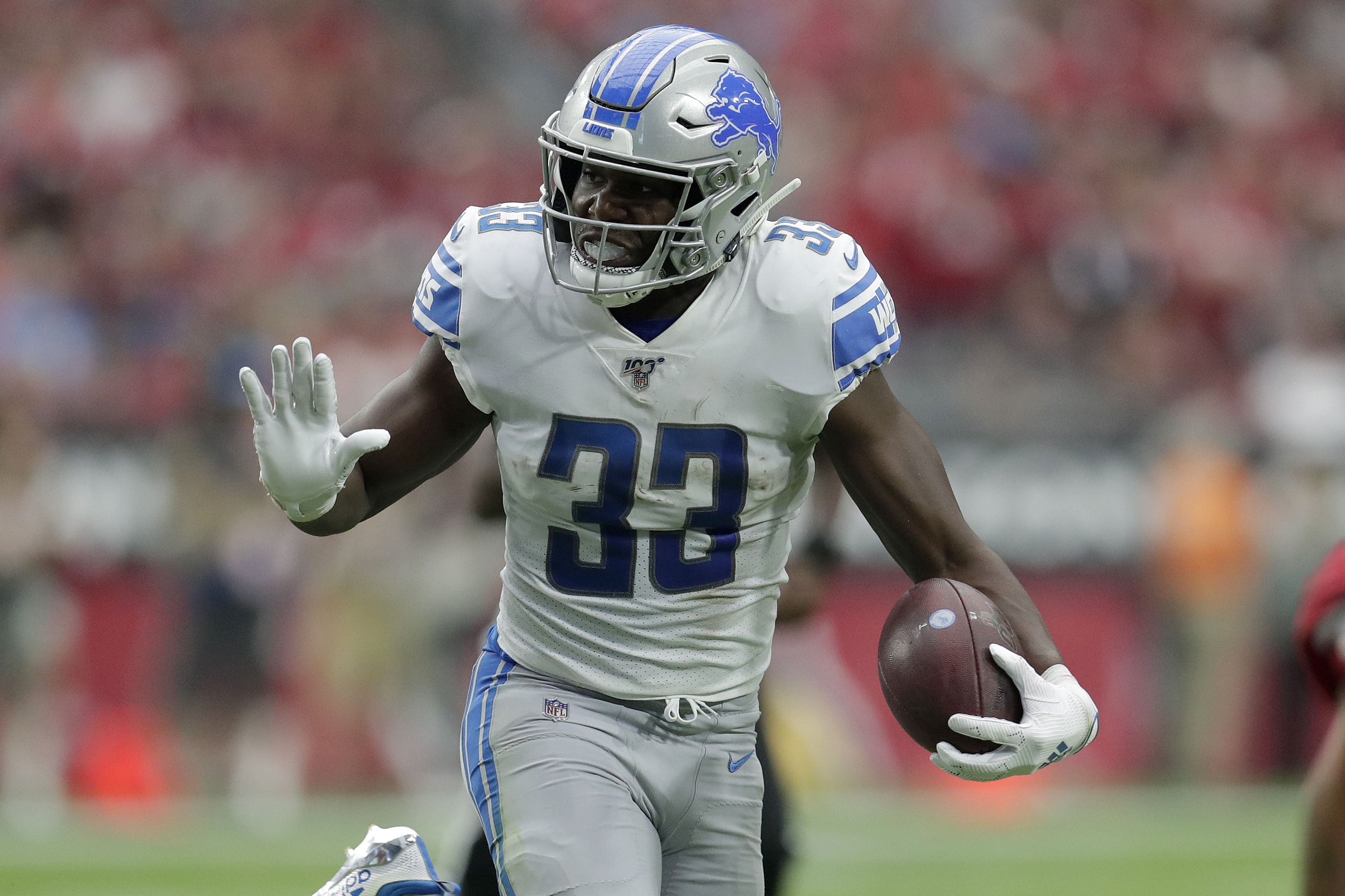 Detroit Lions running back Kerryon Johnson runs during an NFL