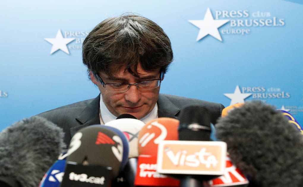 Sacked Catalan leader Carles Puigdemont attends a news conference in Brussels