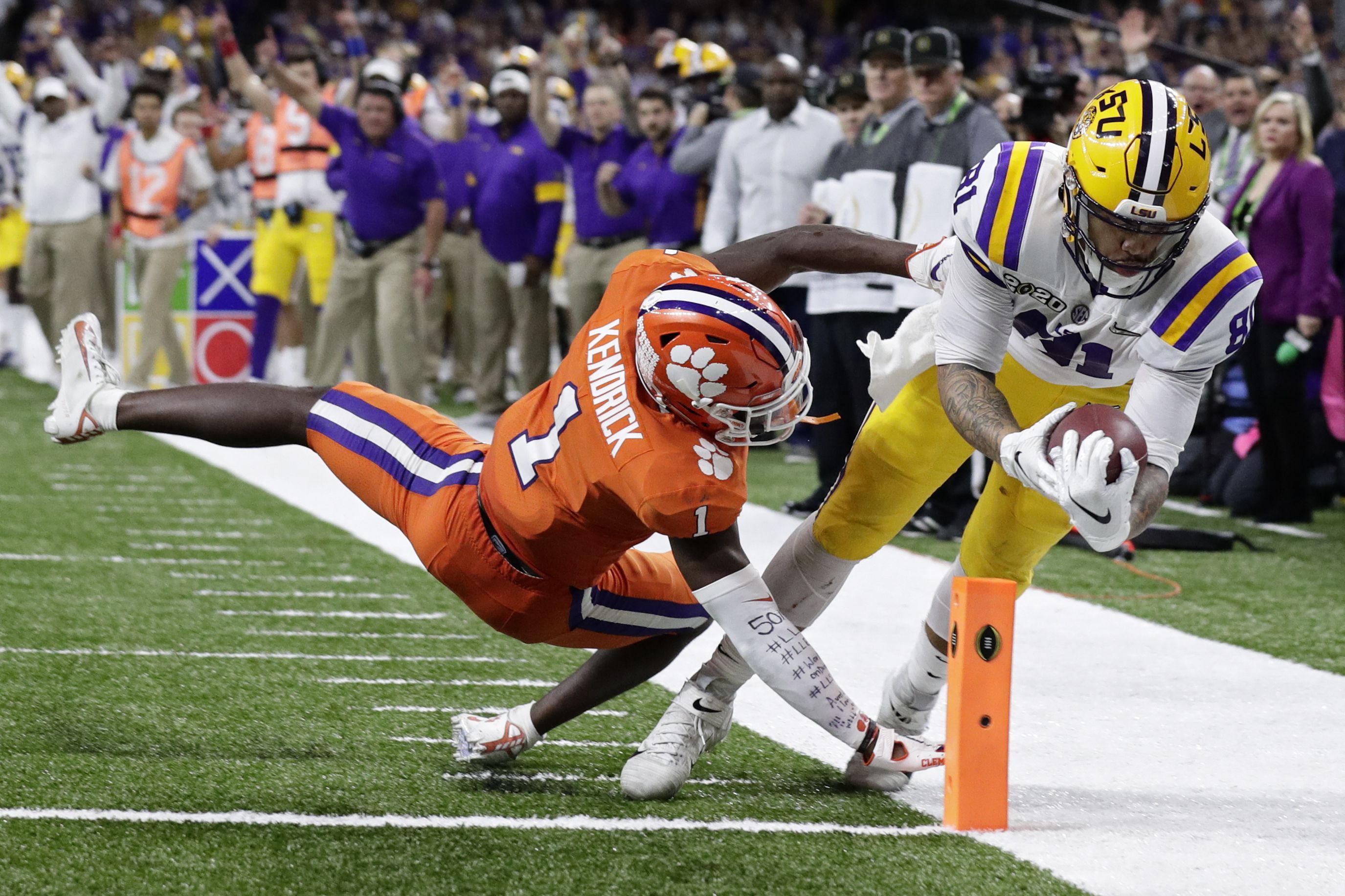 LSU wide receiver Terrace Marshall Jr. catches a touchdown pass over  Clemson cornerback Derion …