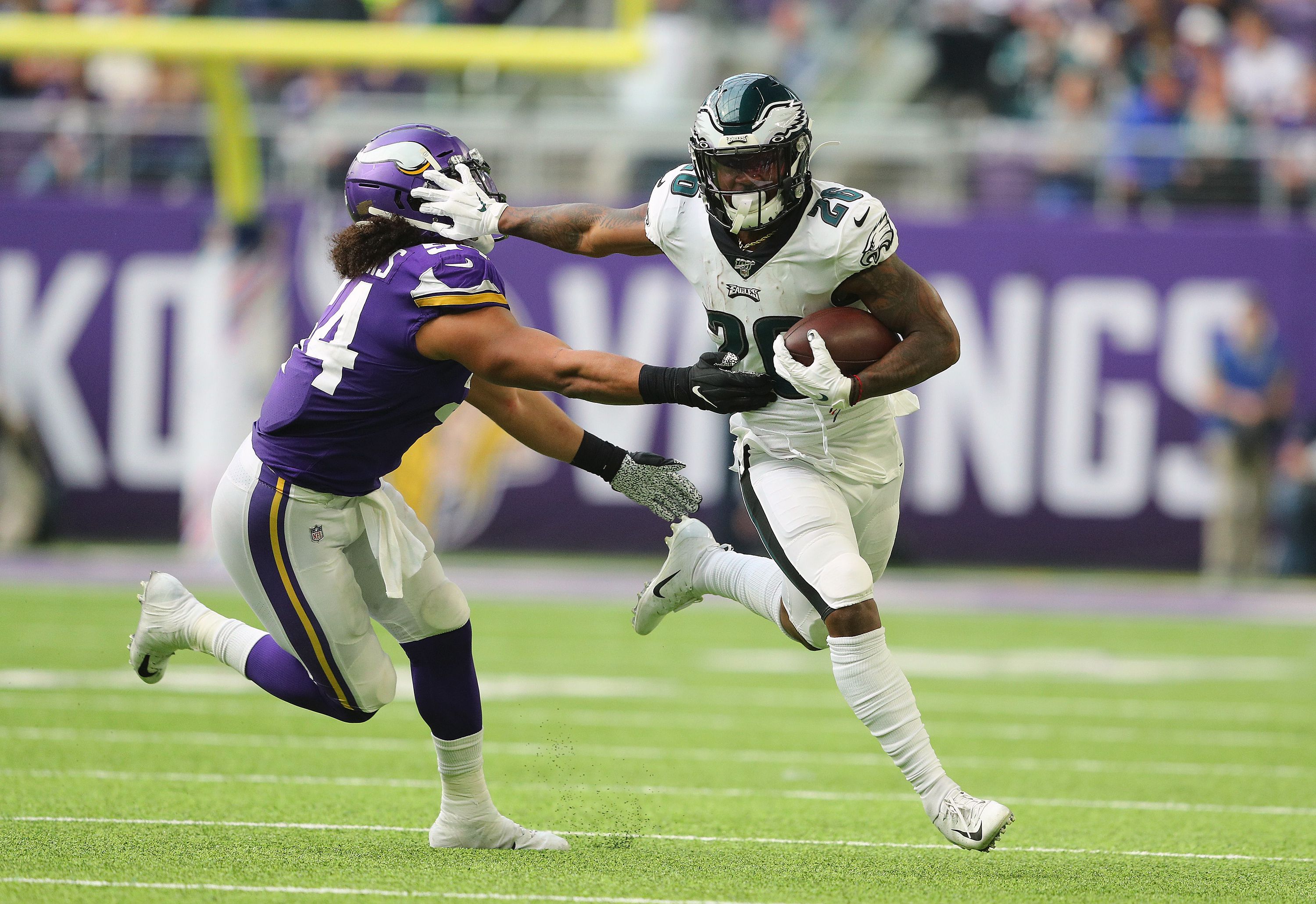 Miles Sanders Philadelphia Eagles Unsigned Celebrating a Touchdown in the  Rain Photograph