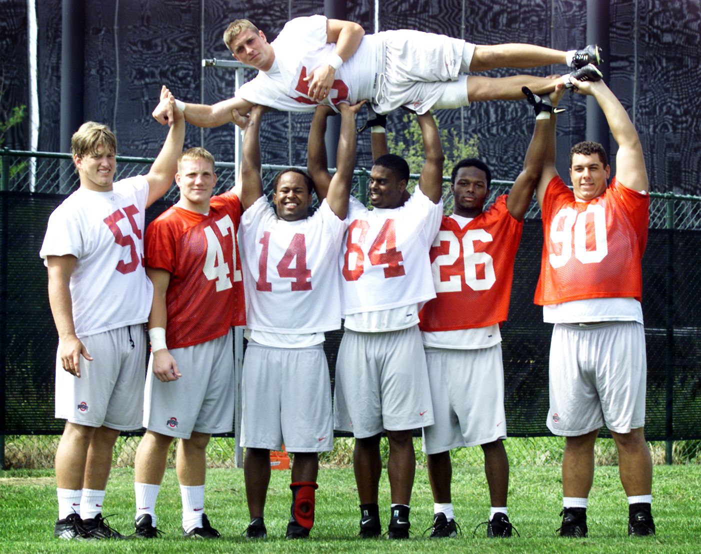 Ohio State linebacker A.J. Hawk (47) celebrates with teammate