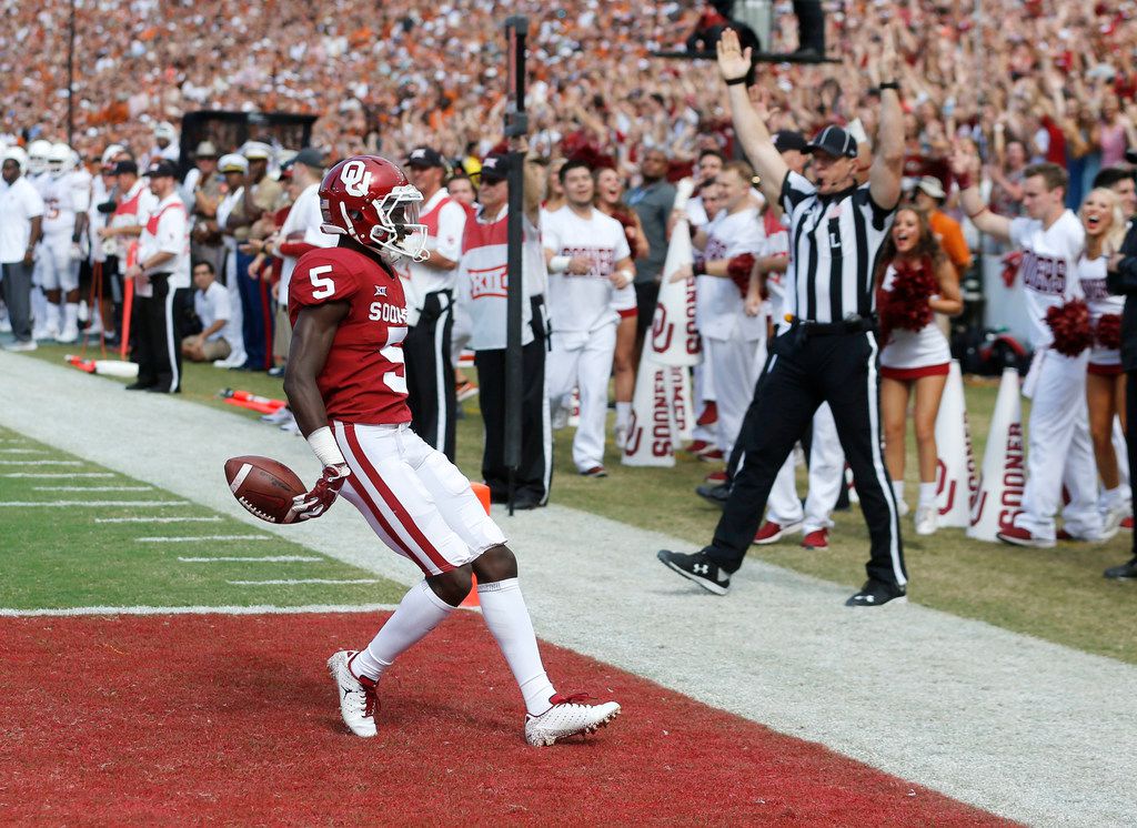 Former Oklahoma WR Marquise 'Hollywood' Brown surprises mom with new car,  house