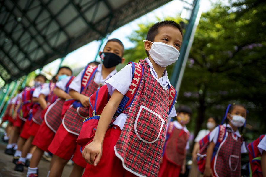 Thai kindergarten students rehearse social distancing and measures to prevent the spread of the coronavirus disease (COVID-19) in Bangkok