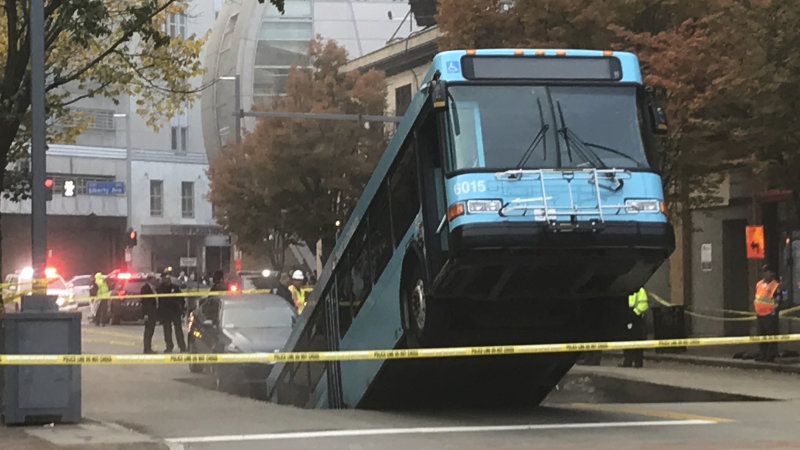 APTOPIX Commuter Bus-Sinkhole