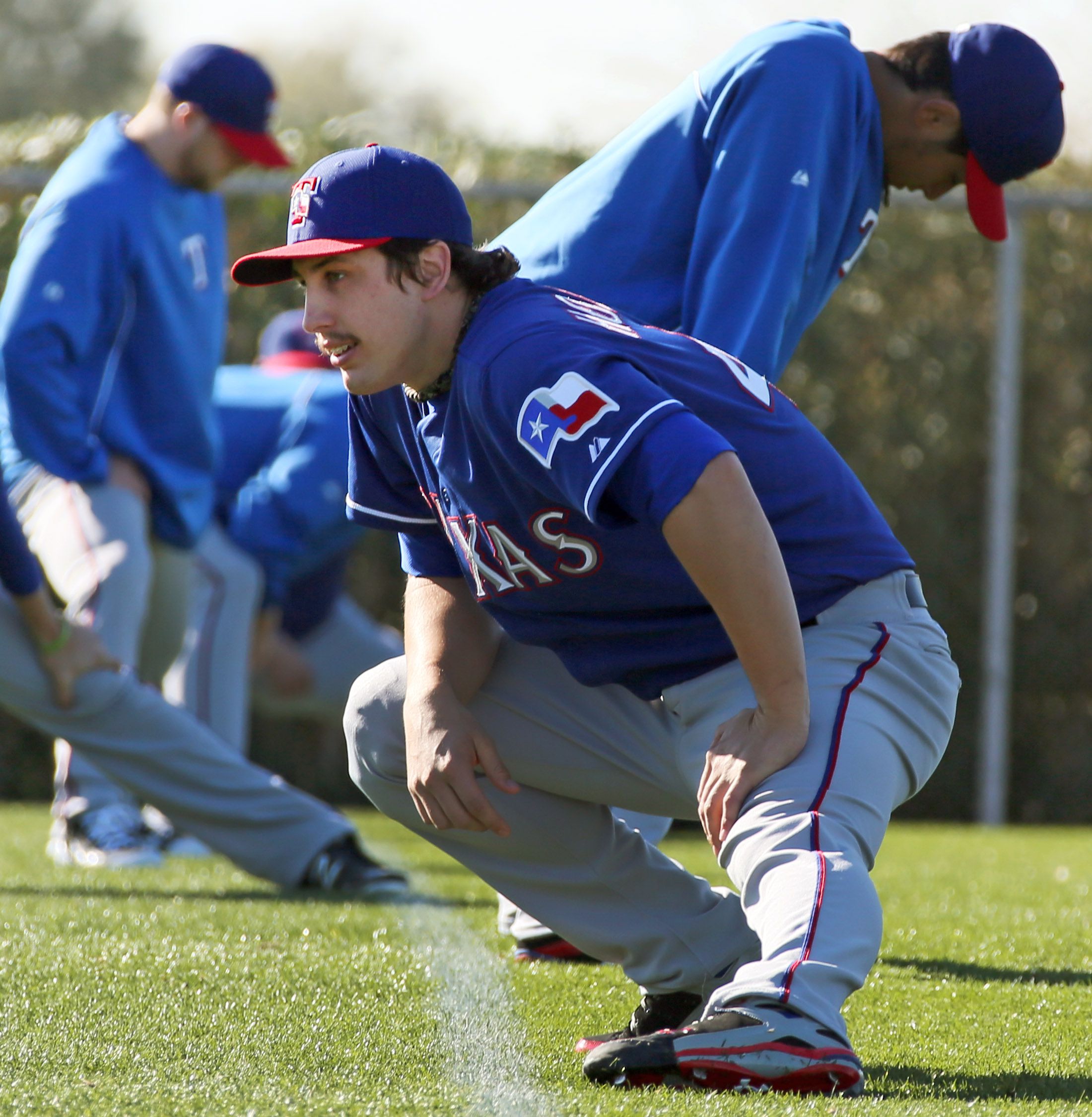 Texas Rangers' Derek Holland is sporting a 'Wild Thing' haircut