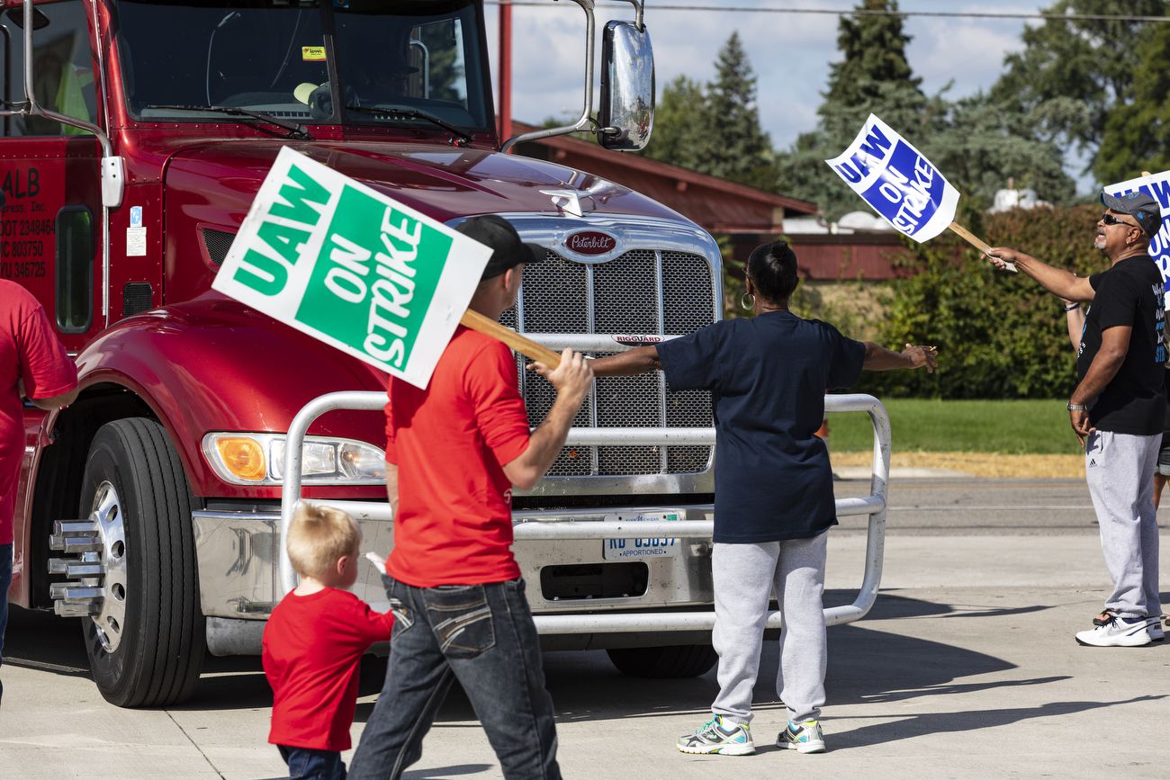 GM takes flak for flip flop;  faces union vote, and Telegram