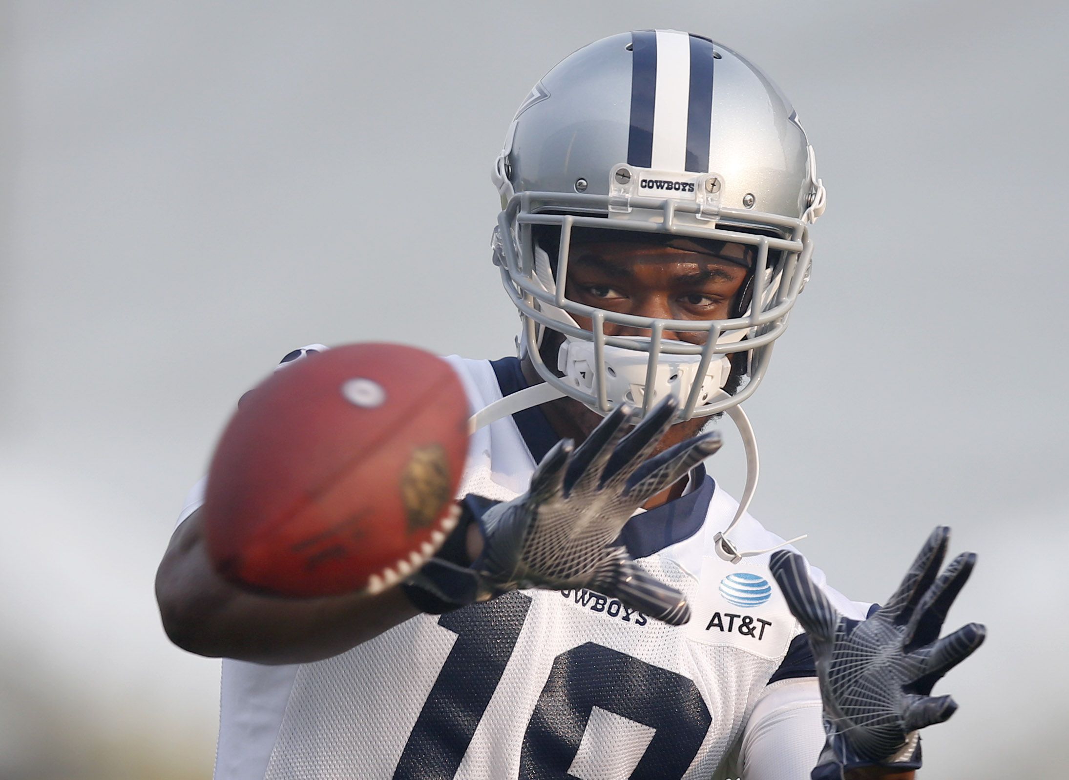 Cowboys training camp photos: Quarterback Dak Prescott rolls out to throw a  dime