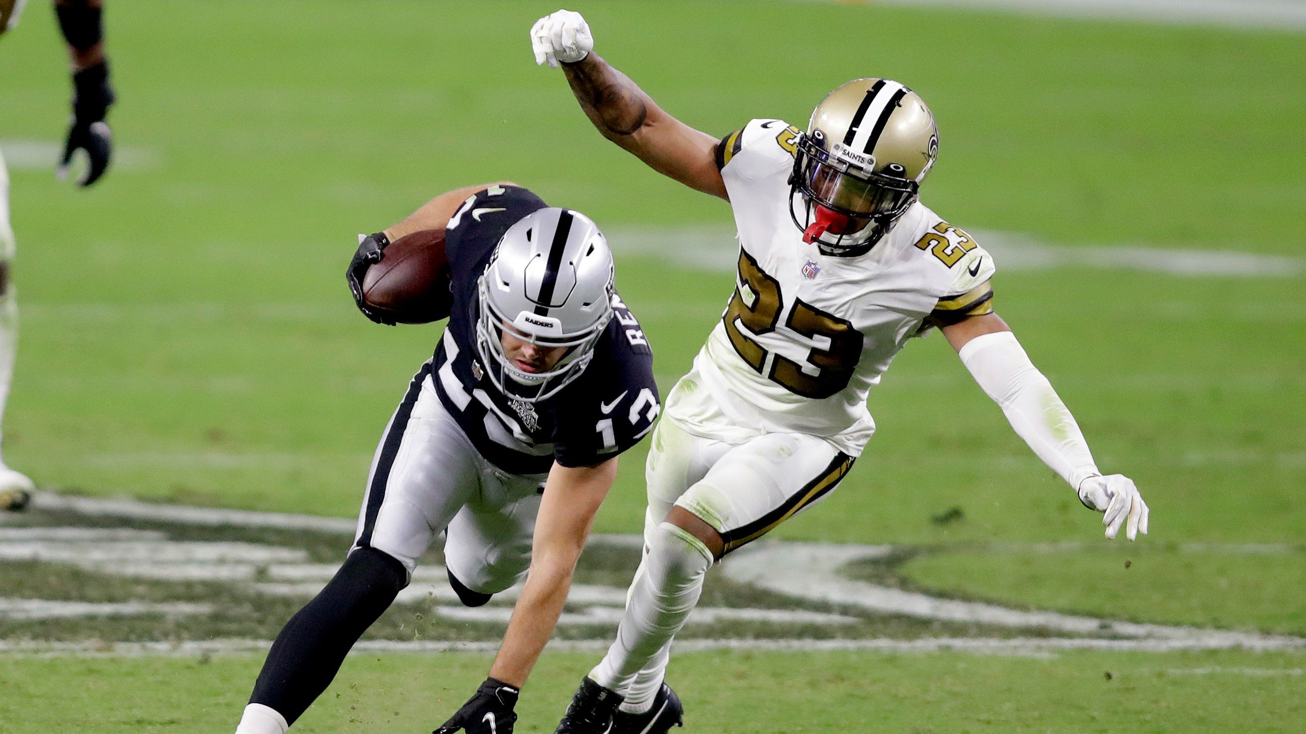 New Orleans Saints cornerback Marshon Lattimore (23) runs back an