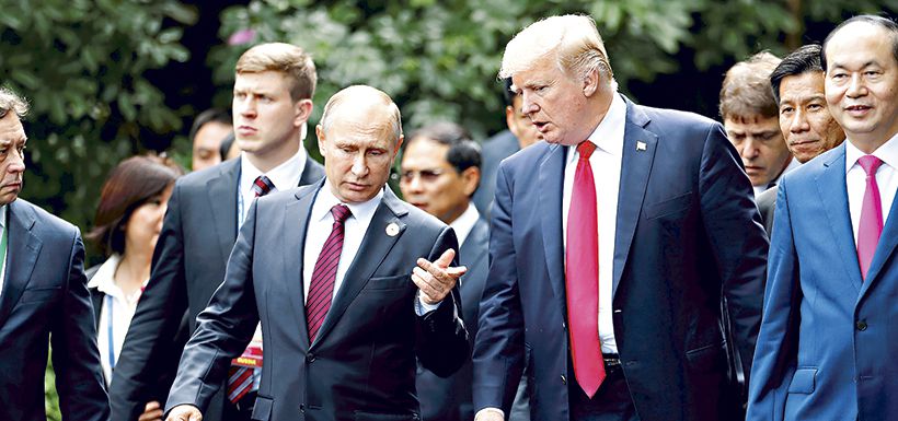 El Presidente ruso, Vladimir Putin, y su homólogo estadounidense, Donald Trump,