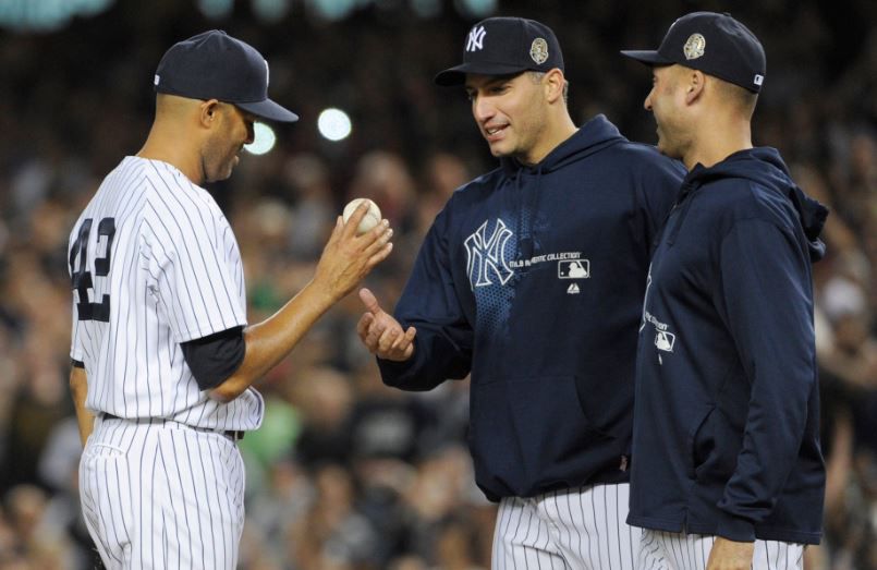 New York Yankees' Andy Pettitte tips his cap after being relieved