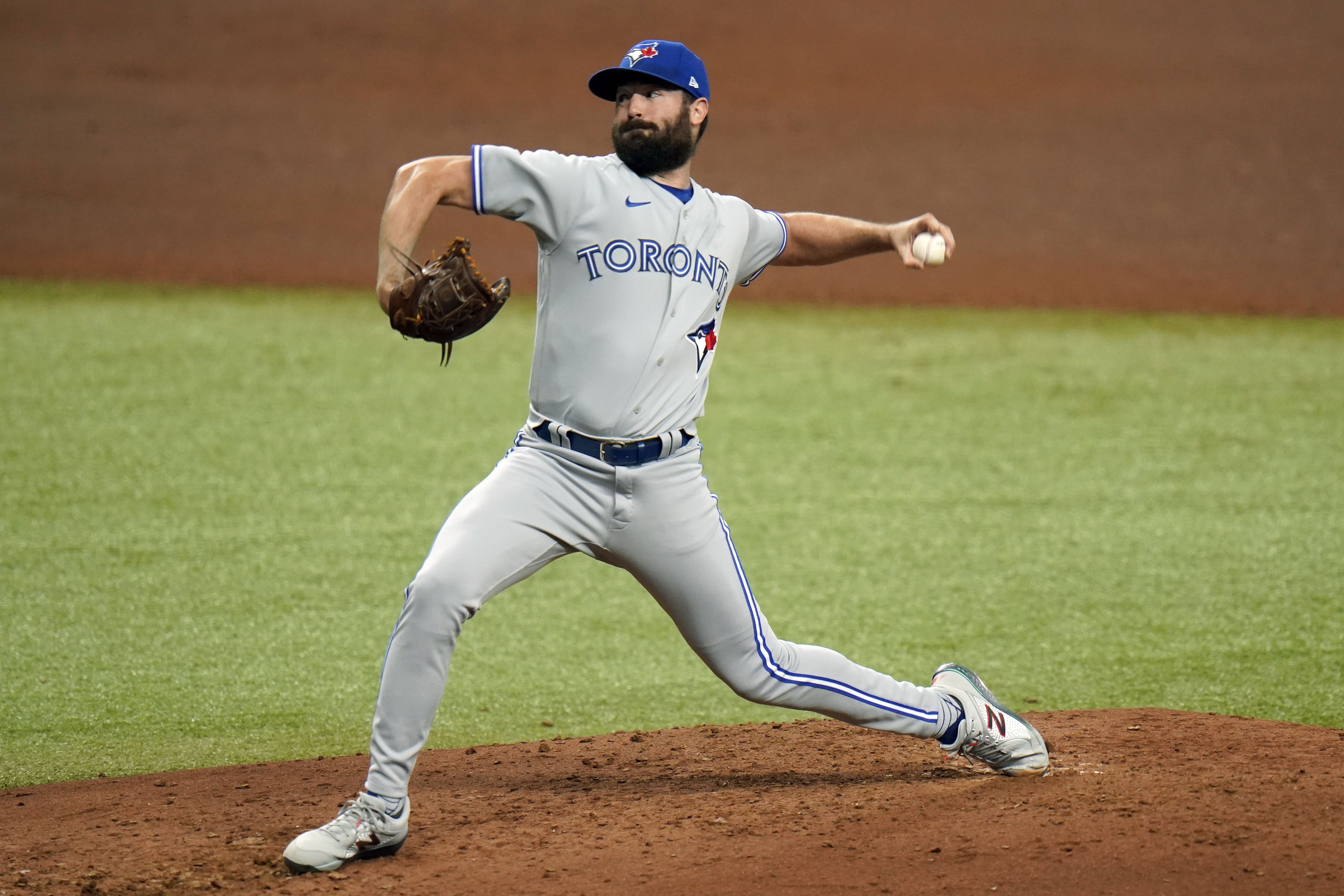 Blue Jays pitcher Hyun Jin Ryu leaves game after being struck by liner on  right knee