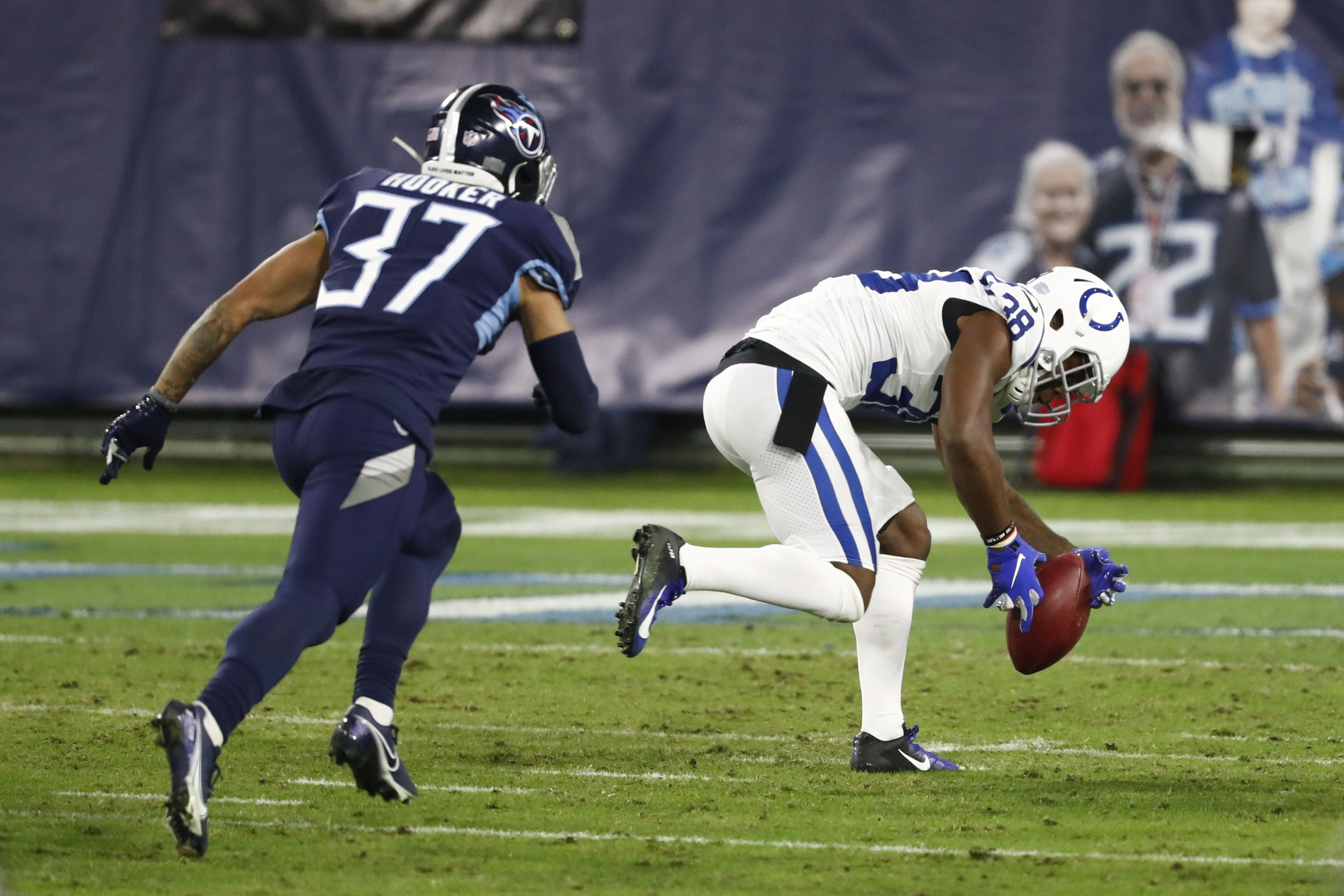 Colts grab tiebreaker in AFC South by beating Titans 34-17 NFL