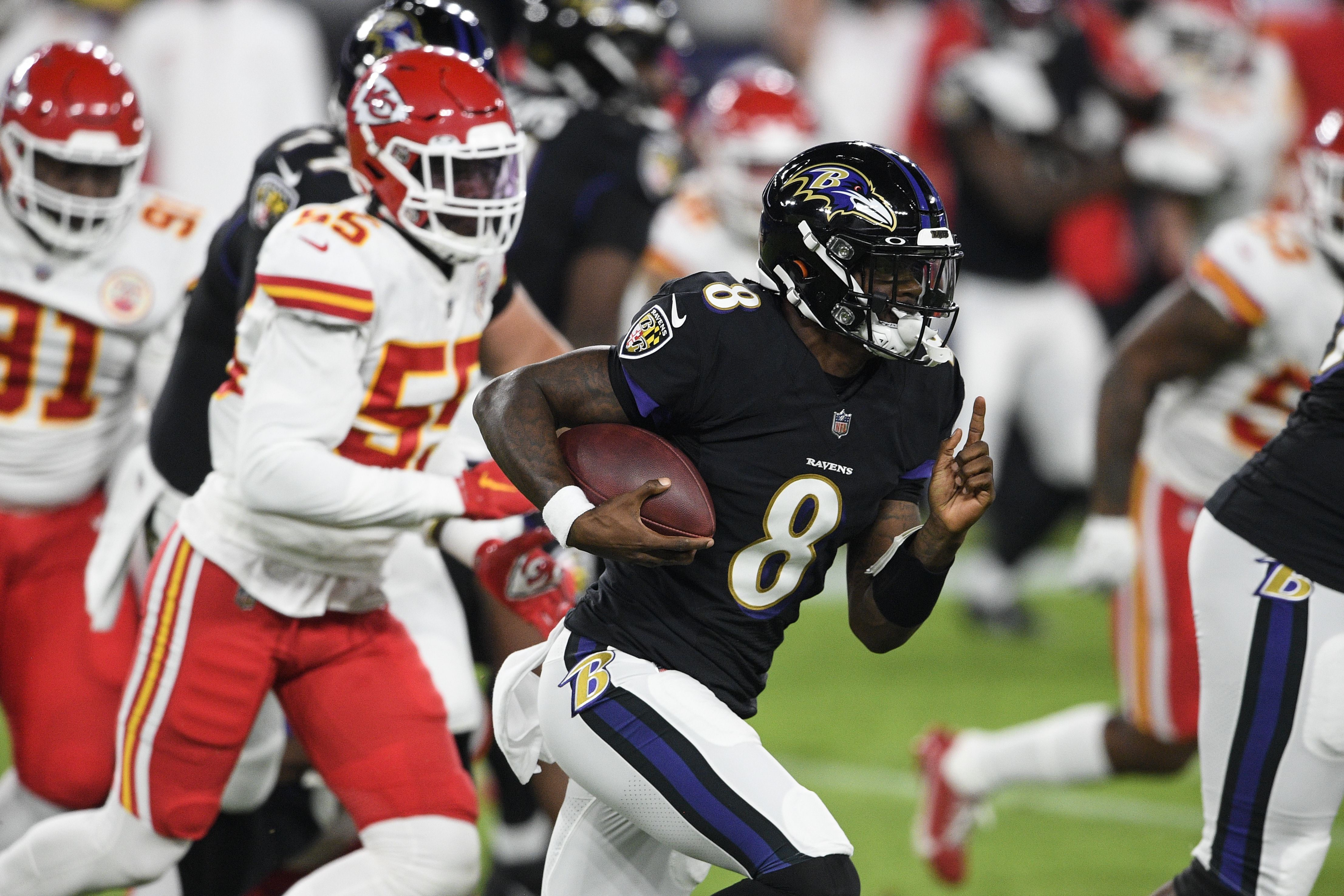 Baltimore Ravens defensive end Calais Campbell (93) looks on between plays  during the first half of an NFL football game against the Kansas City  Chiefs, Sunday, Sept. 19, 2021, in Baltimore. (AP