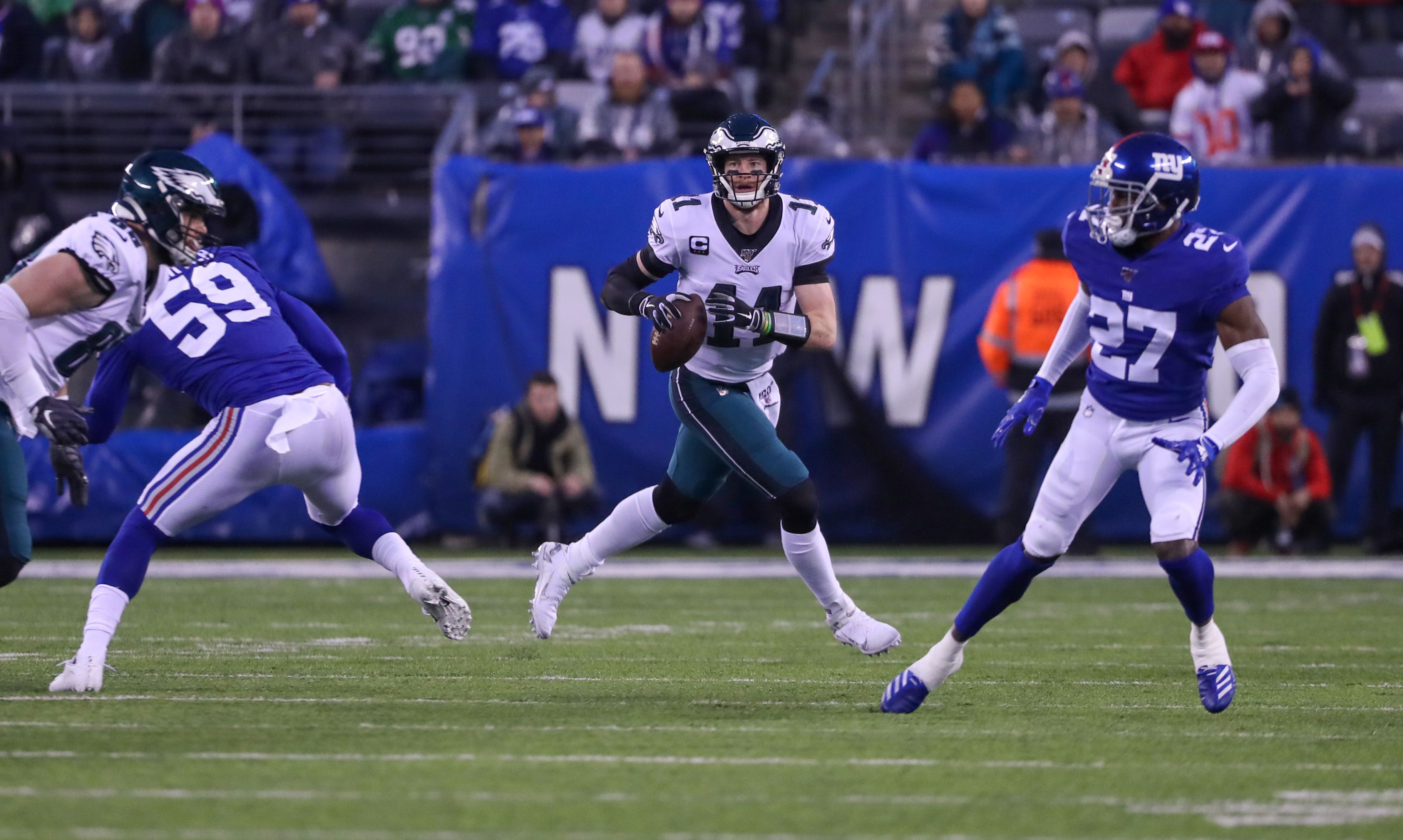 Injury-ravaged Eagles beat Giants 34-17 to win NFC East