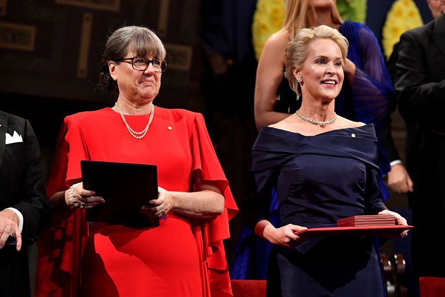 Physics laureate Donna Strickland and chemistry laureate Frances H. Arnold react during the Nobel Prize award ceremony in Stockholm