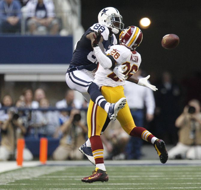 Photos: Dez fumbles; Griffin gallops as Cowboys lose to Redskins