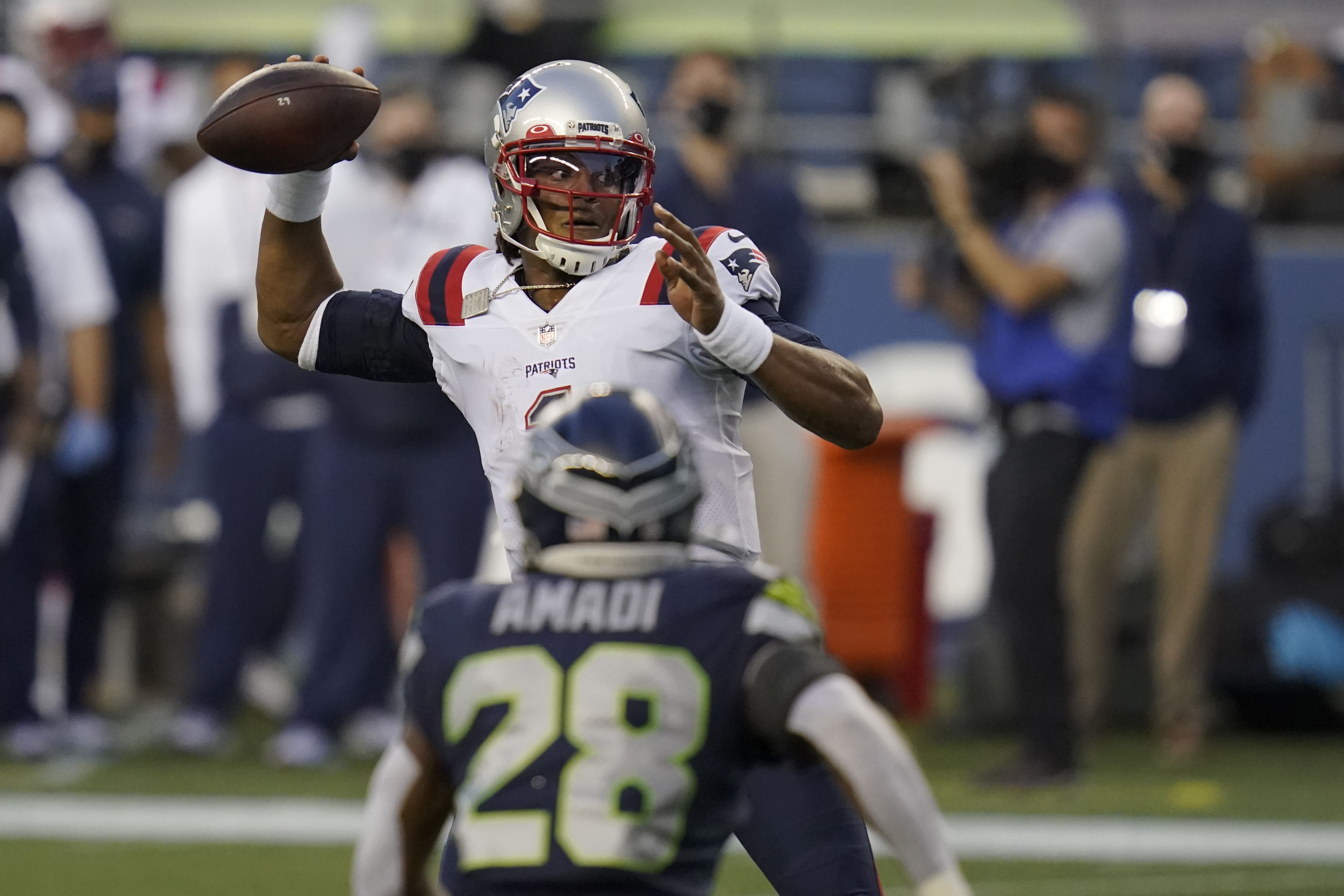 Quarterback Cam Newton shows the Patriots can win despite passing woes