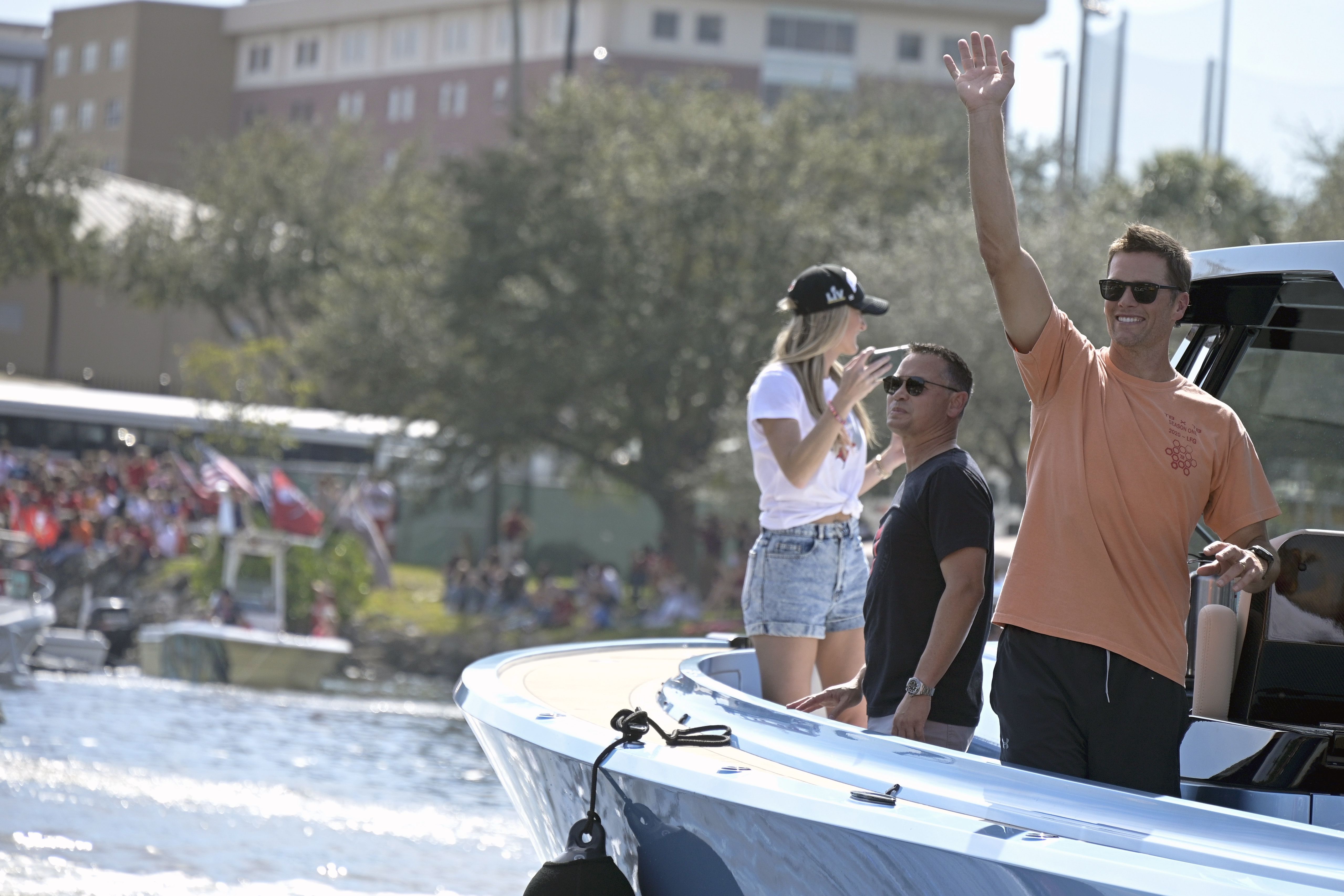 Tom Brady Tosses Lombardi Trophy Across Water During Tampa Bay Buccaneers'  Super Bowl Boat Parade