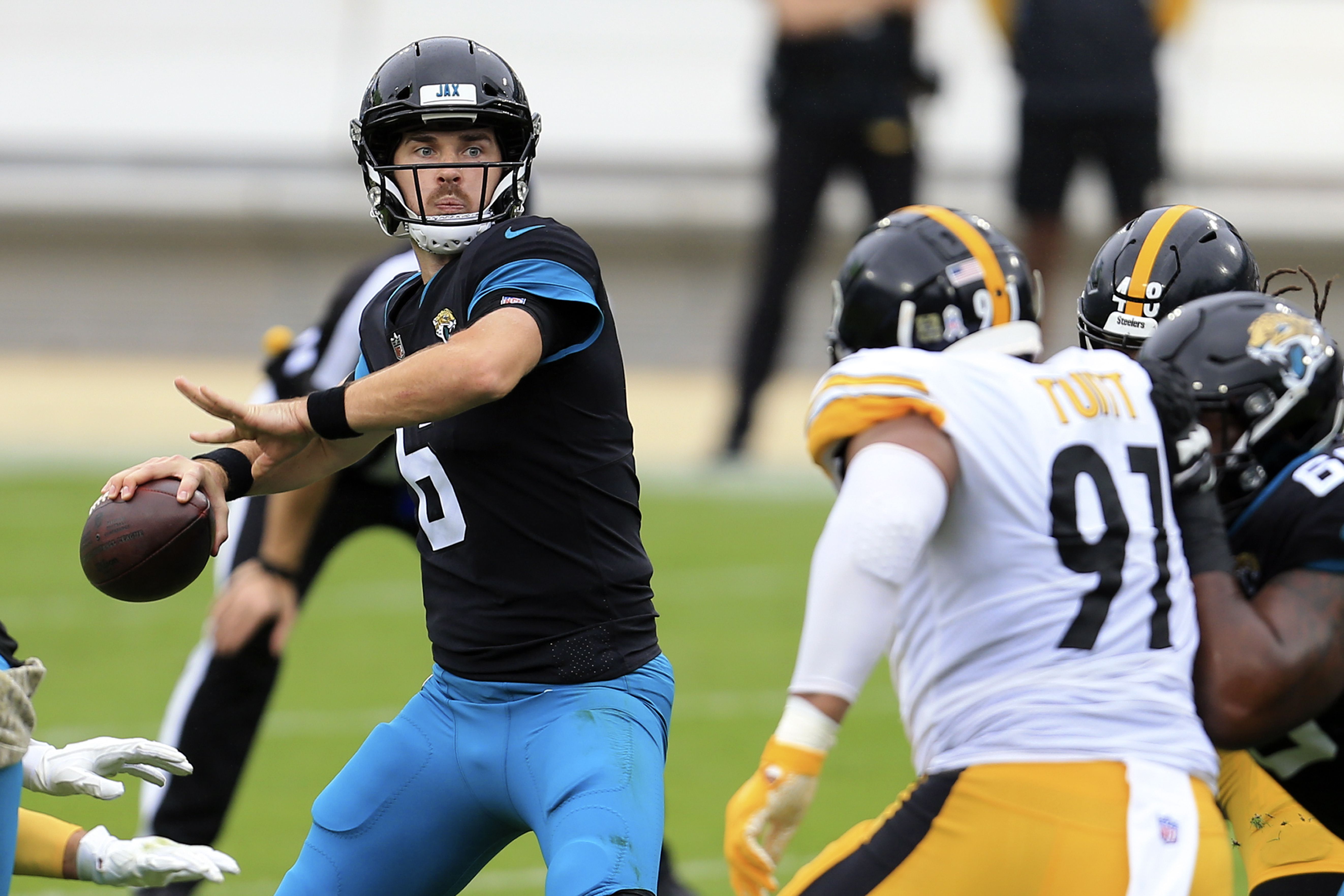 Jacksonville Jaguars quarterback Mike Glennon (2) warms up before