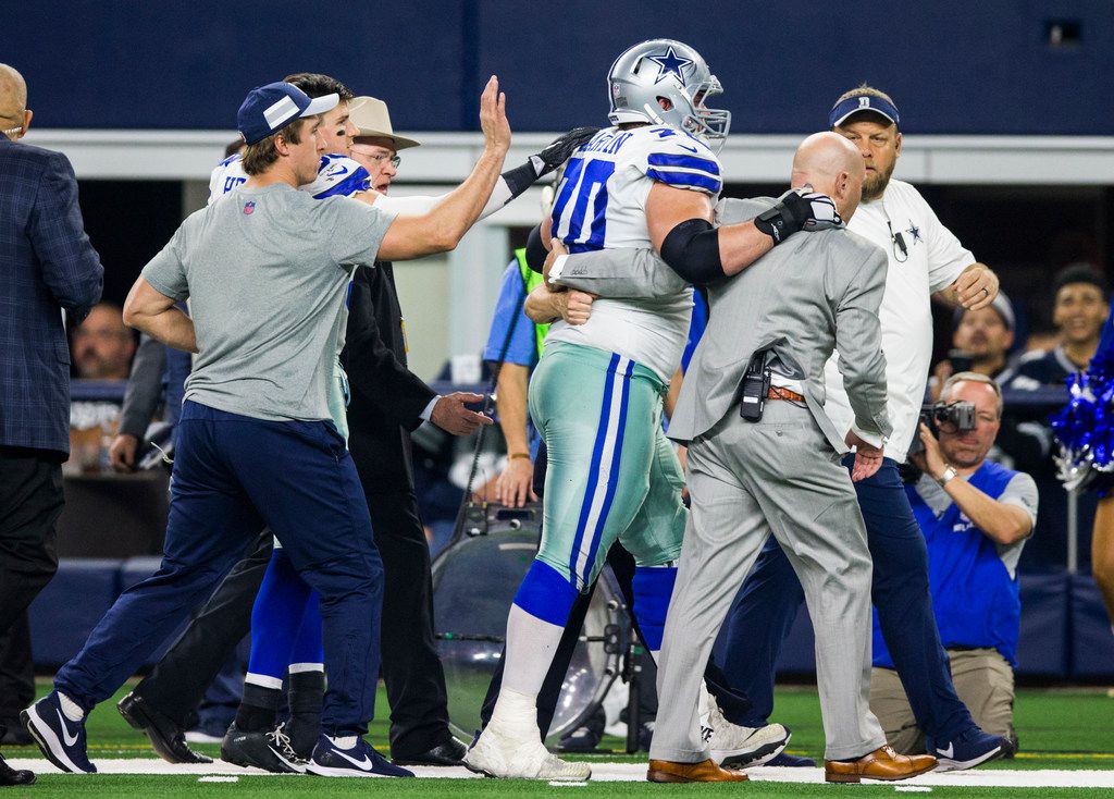 Dallas OL Zack Martin hurts calf, won't return vs Washington