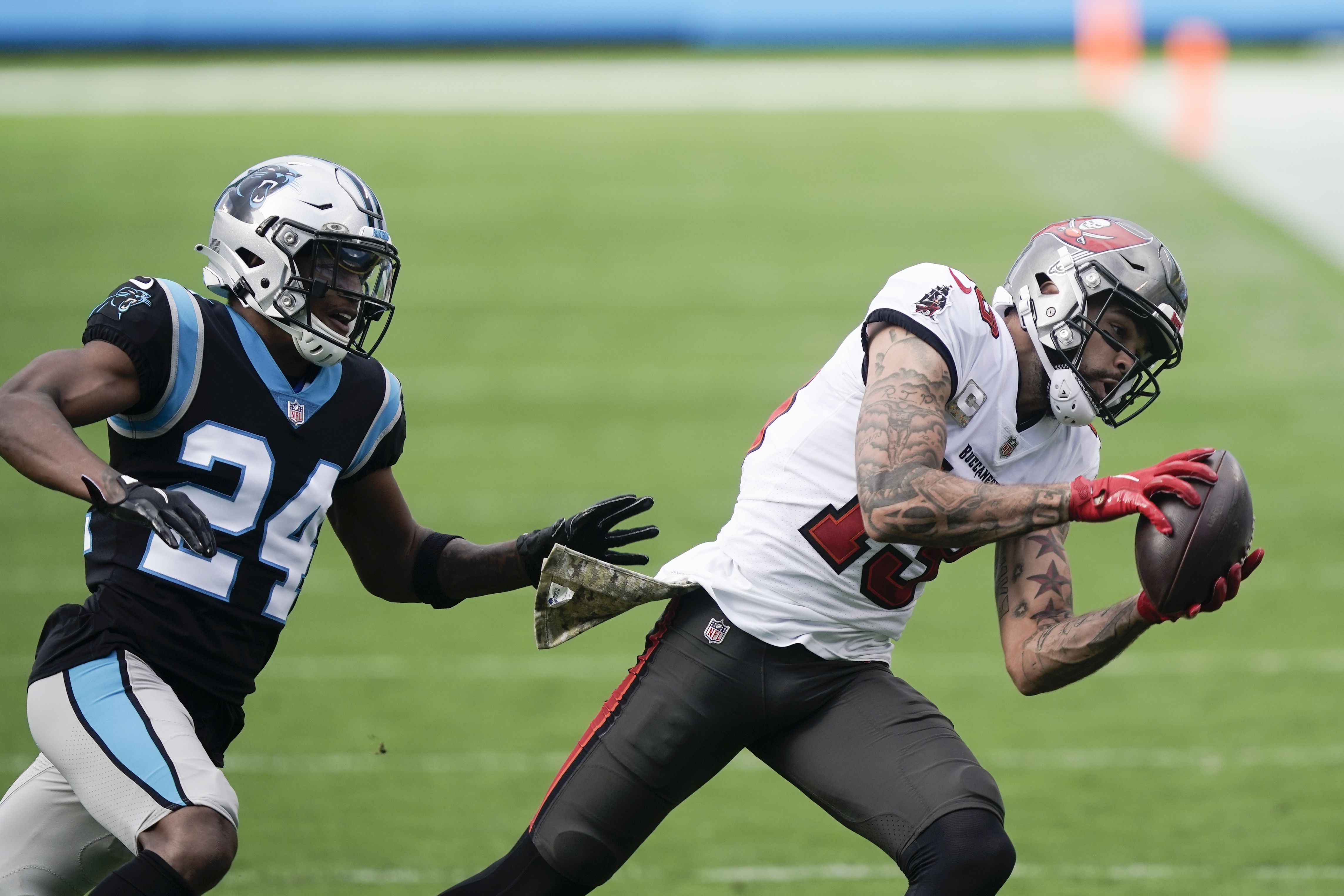 Carolina Panthers linebacker Shaq Thompson (7) reacts after making a play  on defense during an NFL football game against the Atlanta Falcons,  Thursday, Nov. 10 2022, in Charlotte, N.C. (AP Photo/Brian Westerholt