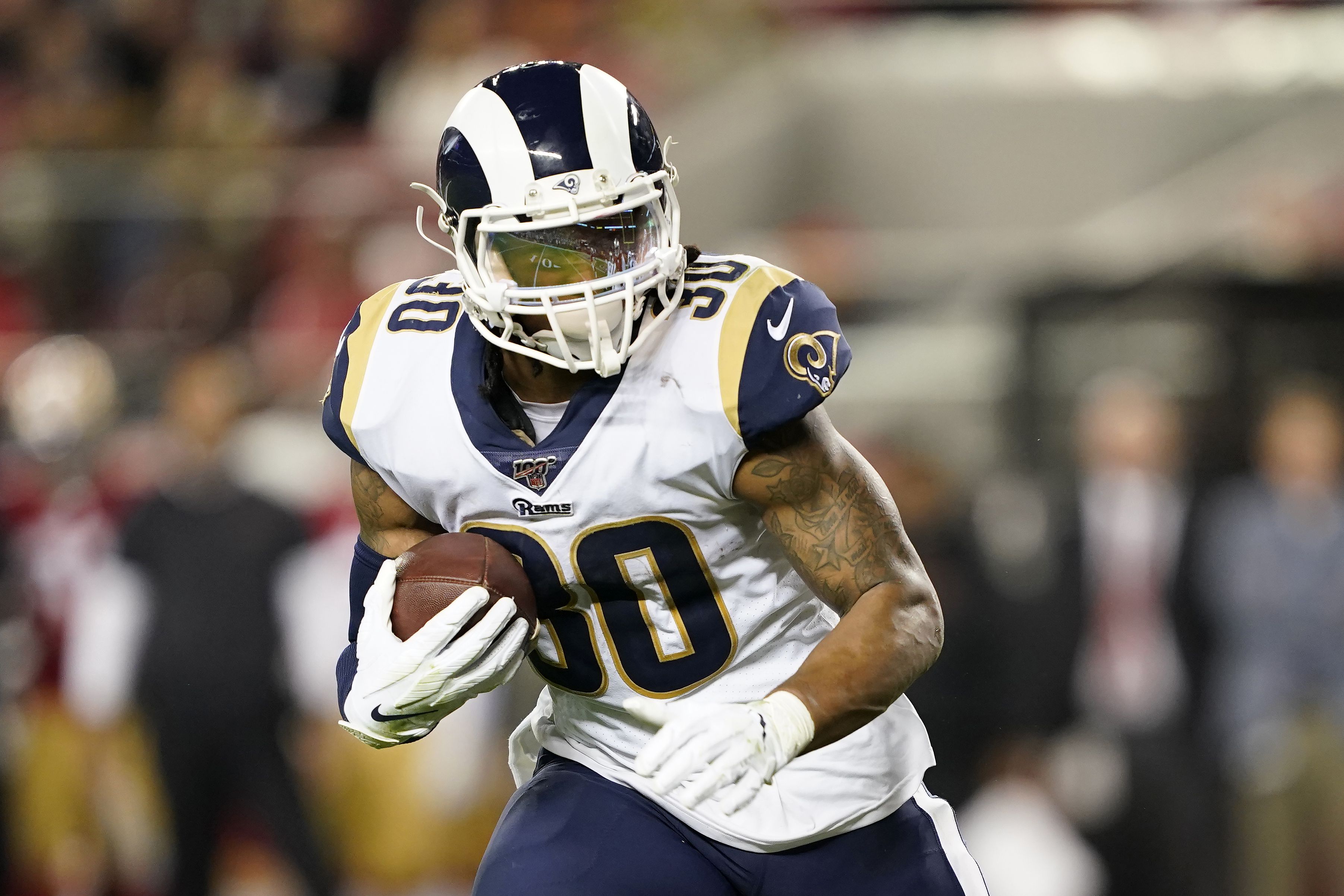 Los Angeles Rams running back Todd Gurley II (30) gains yards on a run  during an NFL football game against the New Orleans Saints, Sunday,  September 15, 2019 in Los Angeles. The