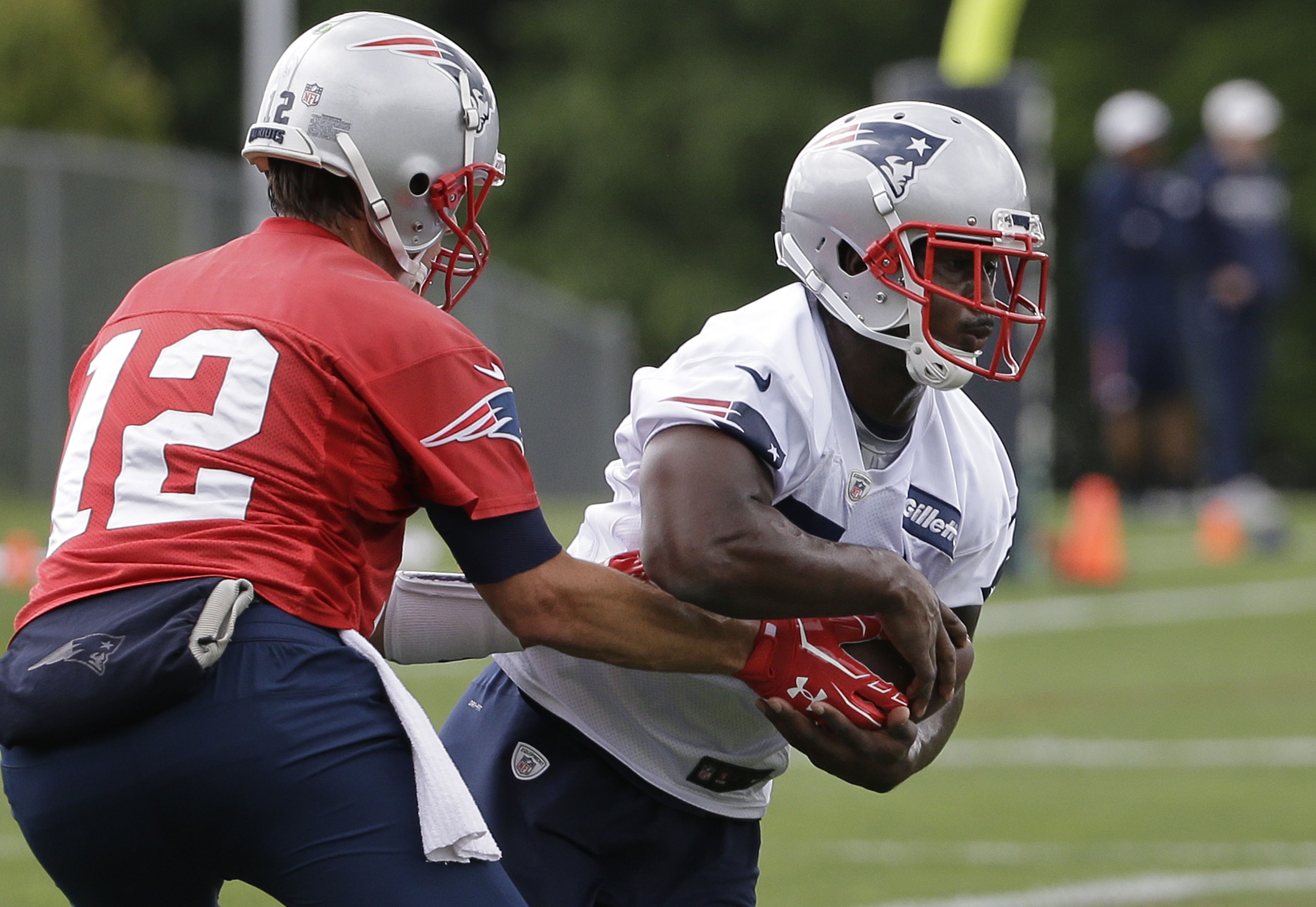 Patriots running back Sony Michel supports and competes with Damien Harris