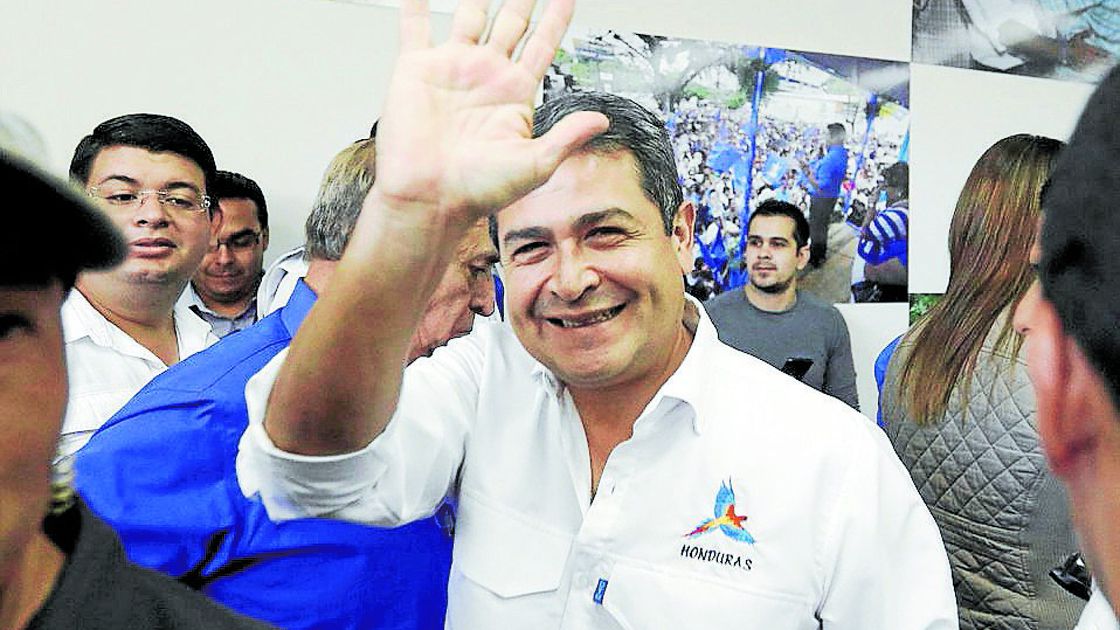 Honduras President and National Party candidate Juan Orlando Hernandez gestures at National Party center in Tegucigalpa