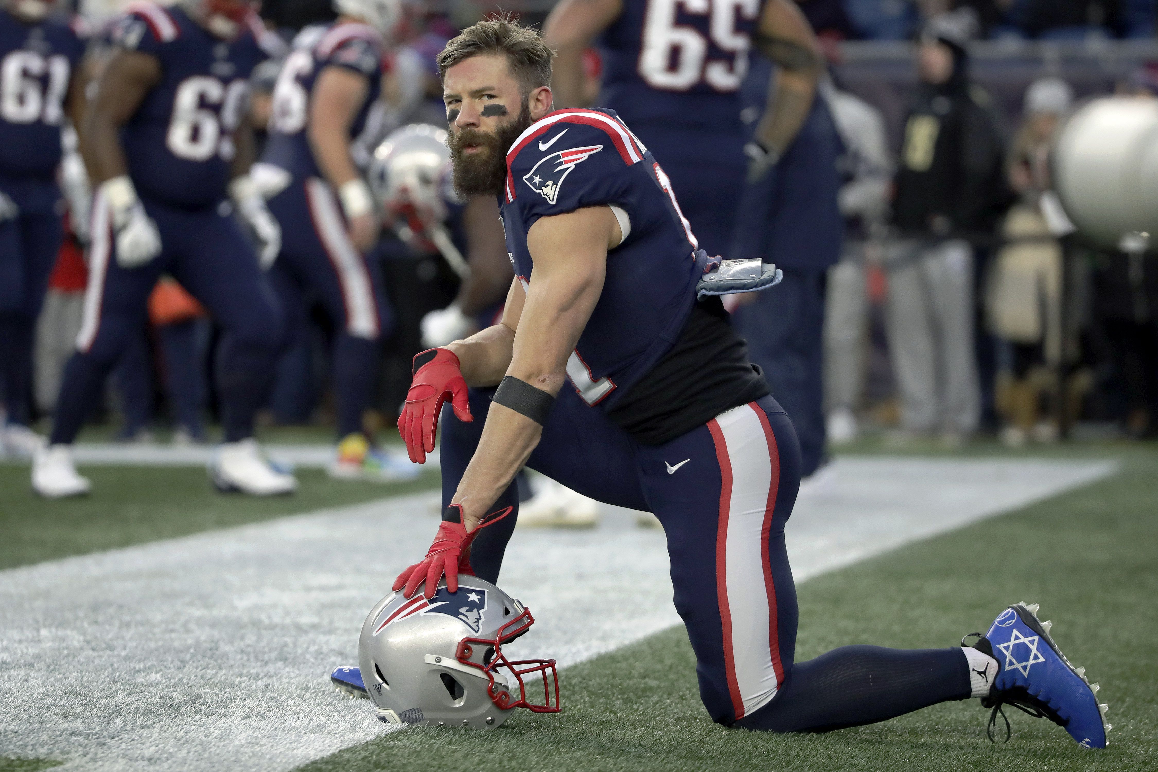 Julian Edelman limited in Patriots practice with knee injury